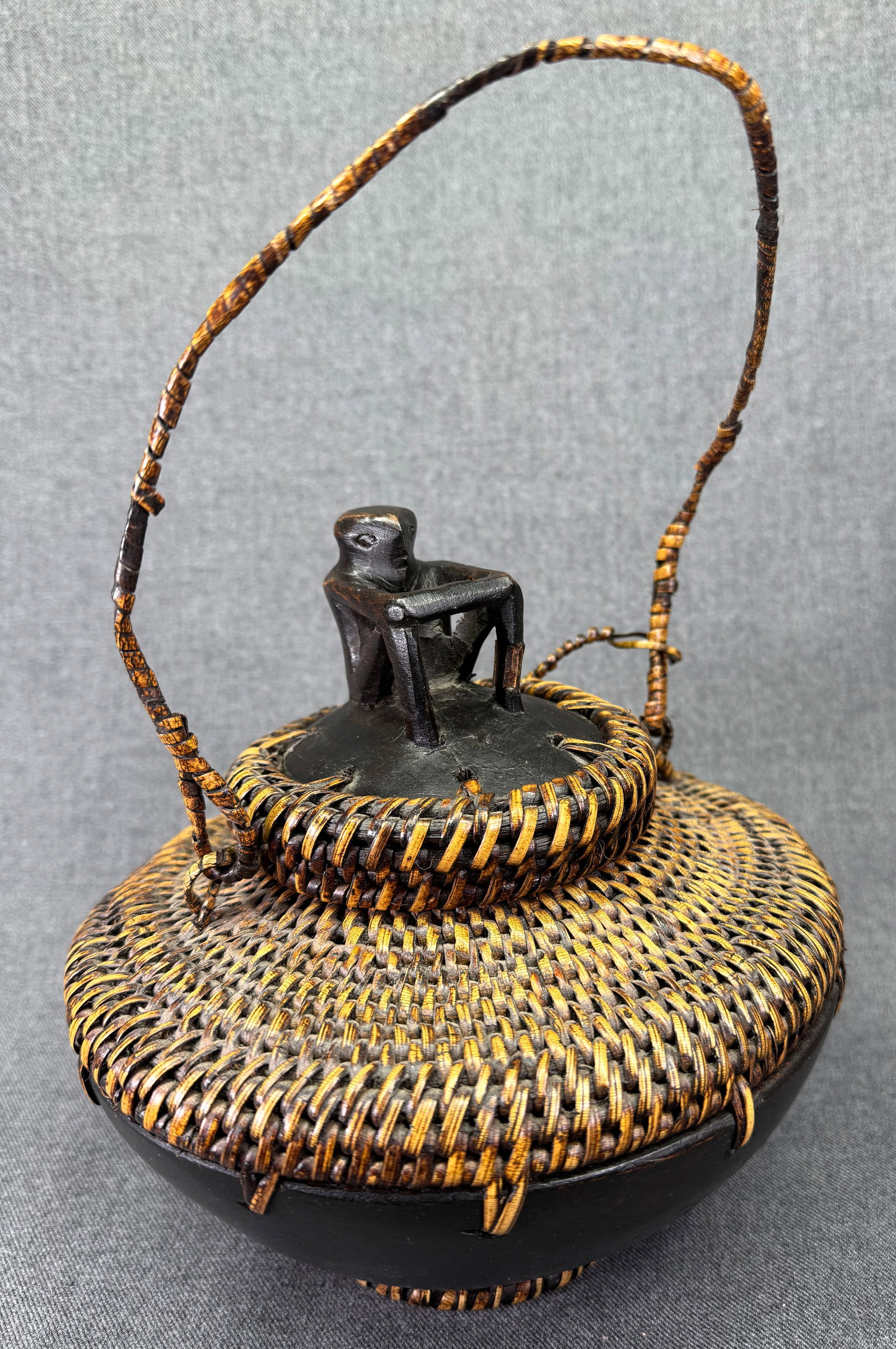 Ifugao Philippines Ulbong Rice Basket. Wood, rattan. #B: Ifugao Philippines Ulbong Rice Basket. Wood, rattan. It measures diameter of the basket is 7 1/ 2 inches, 11 inches tall handle included and 7 1/2 tall not considering the handle. For measures please 