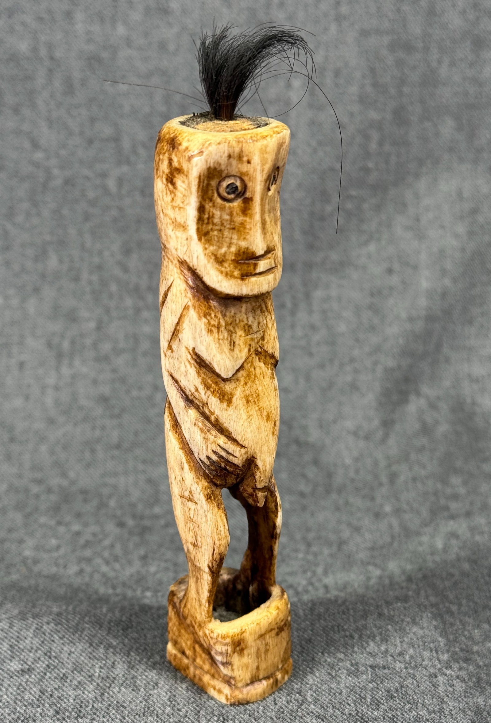 Lombok Island Figure.: Lombok Island Figure. Carved bone, animal hair. For measures please refer to the pictures taken with a measuring tape. IN HOUSE FLAT SHIPPING & HANDLING COST WITHIN ALL THE U.S. : $10 To bypass LiveSh