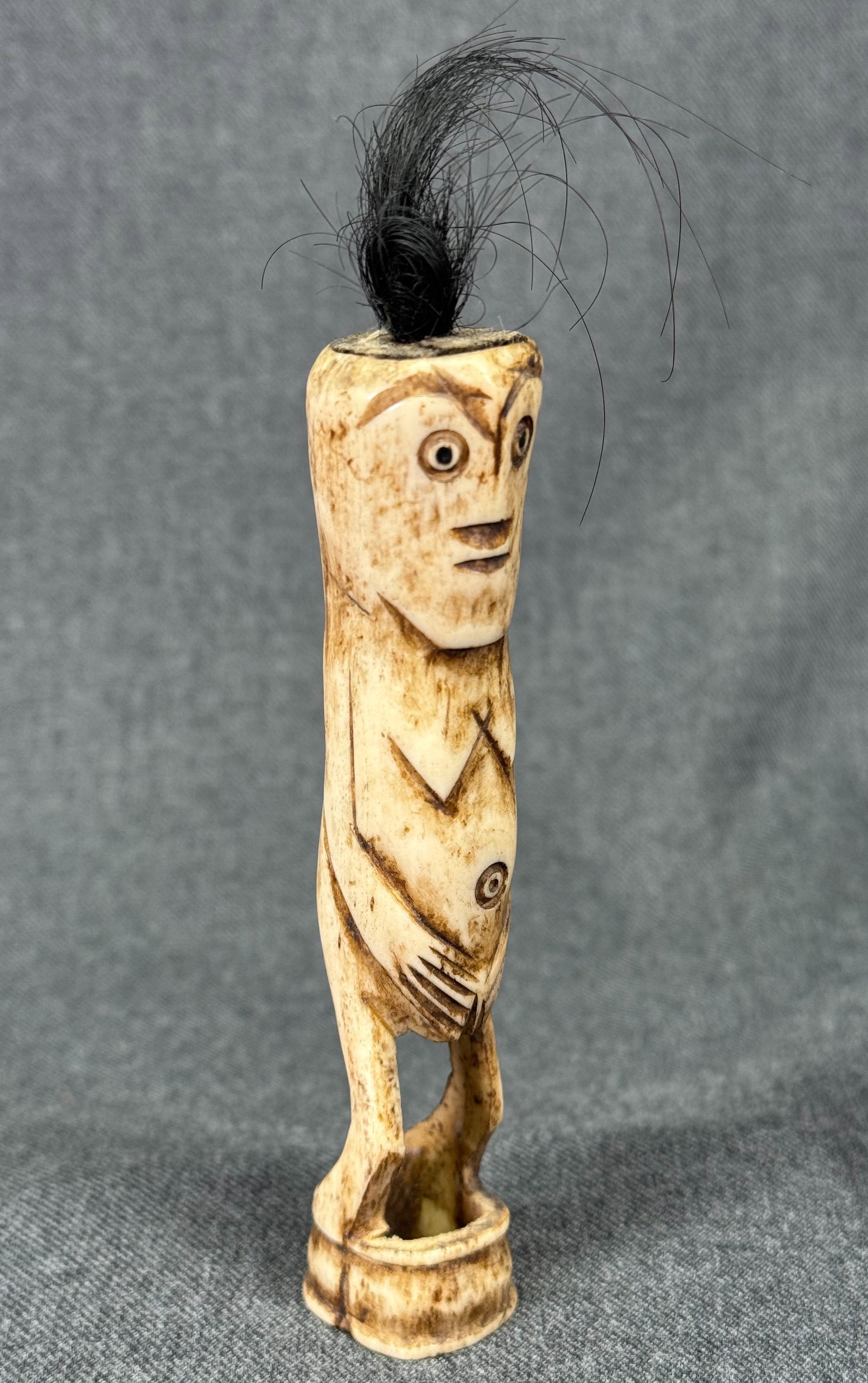 Lombok Island Figure.: Lombok Island Figure. Carved bone, animal hair. For measures please refer to the pictures taken with a measuring tape. IN HOUSE FLAT SHIPPING & HANDLING COST WITHIN ALL THE U.S. : $10 To bypass LiveSh