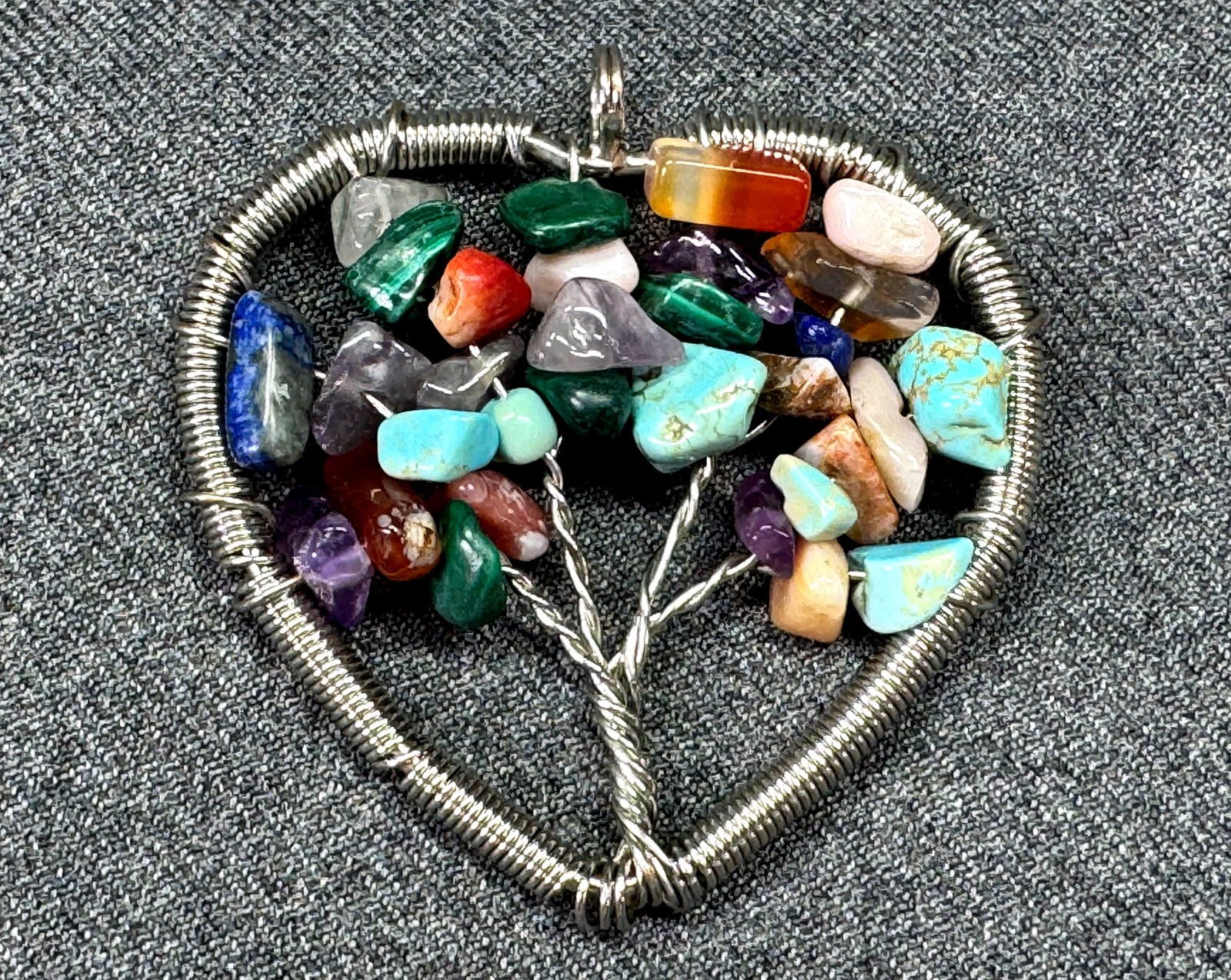 Handcrafted Wire & Gemstone Chip Chakra Tree of Life Heart Pendant. *L: Handcrafted Wire & Gemstone Chip Chakra Tree of Life Heart Pendant. Silver-tone. Unmarked. For measures please refer to the pictures taken with a measuring tape. Weight: 17 Grams. IN HOUSE FLAT SHIPPI