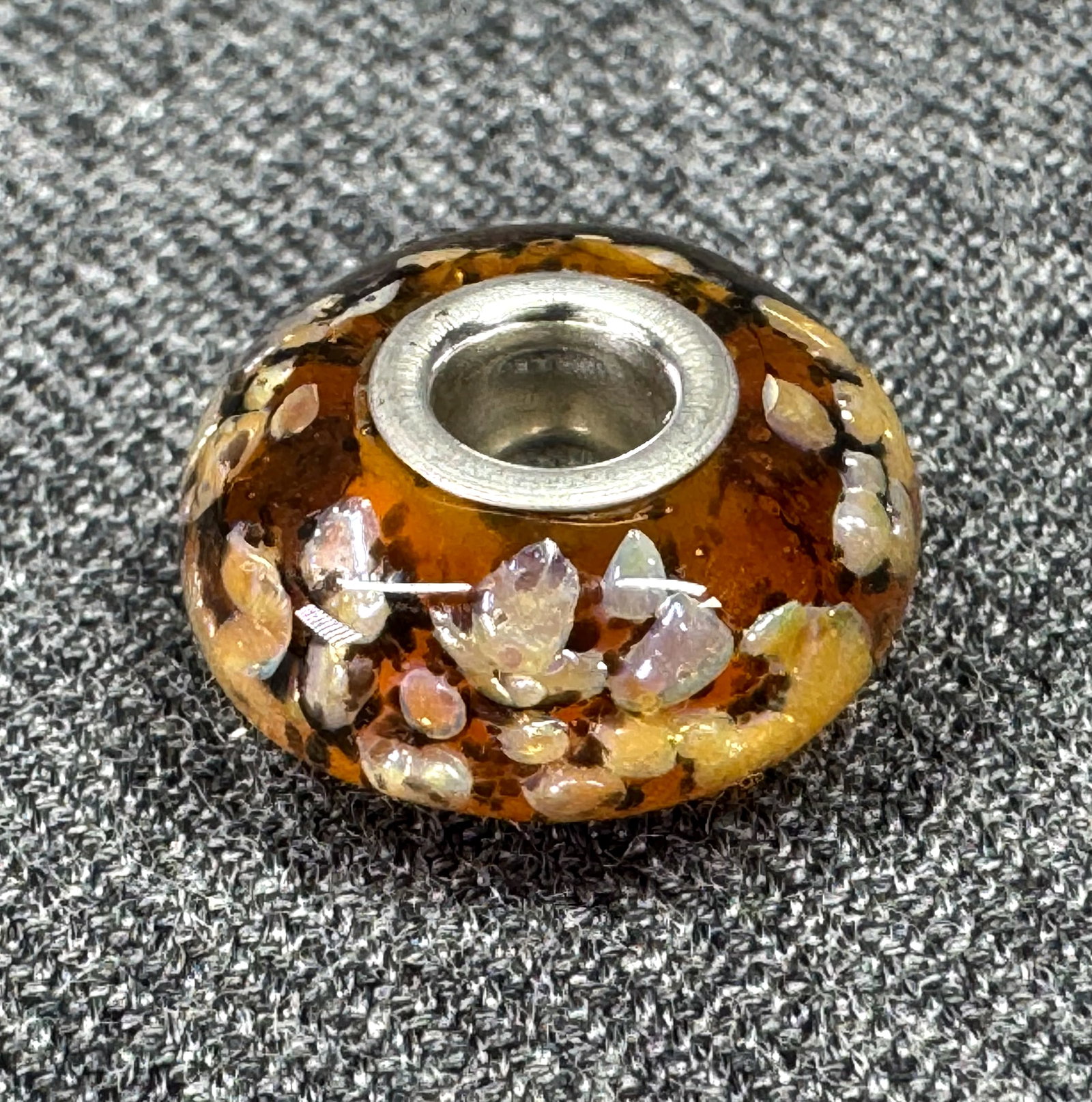 Authentic Chamilia Retired Murano Glass Fall Leaf Sterling Charm Bead. *L: Authentic Chamilia Retired Murano Glass Fall Leaf Sterling Charm Bead. Marked. For measures please refer to the pictures taken with a measuring tape. Weight: 2.11 Grams. IN HOUSE FLAT SHIPPING & HANDL
