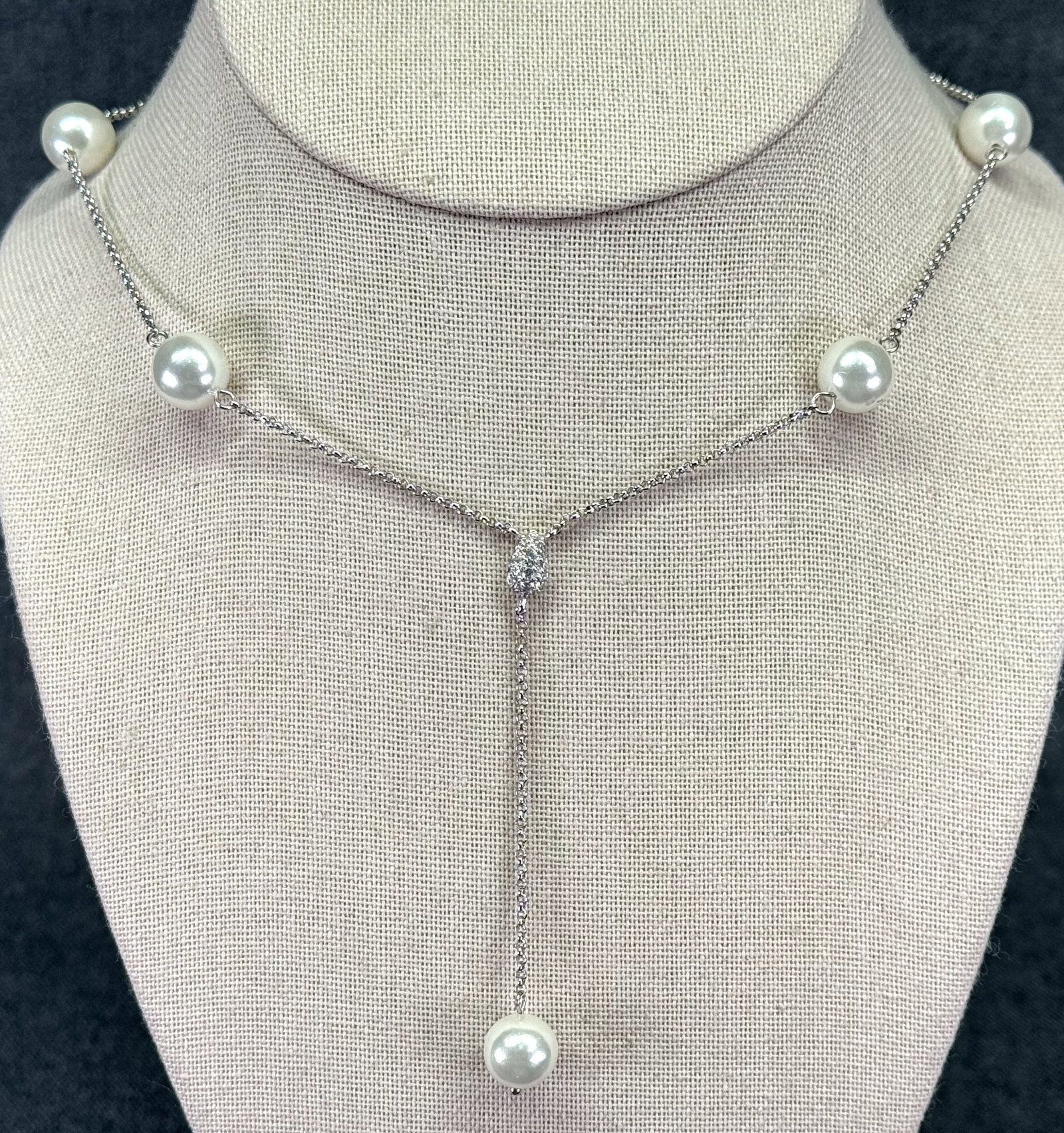 Silver-tone Faux Pearl & Crystals Lariat Drop Y Necklace. Bridal. *J: Silver-tone Faux Pearl & Crystals Lariat Drop Y Necklace. Bridal. Unmarked. For measures please refer to the pictures taken with a measuring tape. Weight: 7 Grams. IN HOUSE FLAT SHIPPING & HANDLING CO