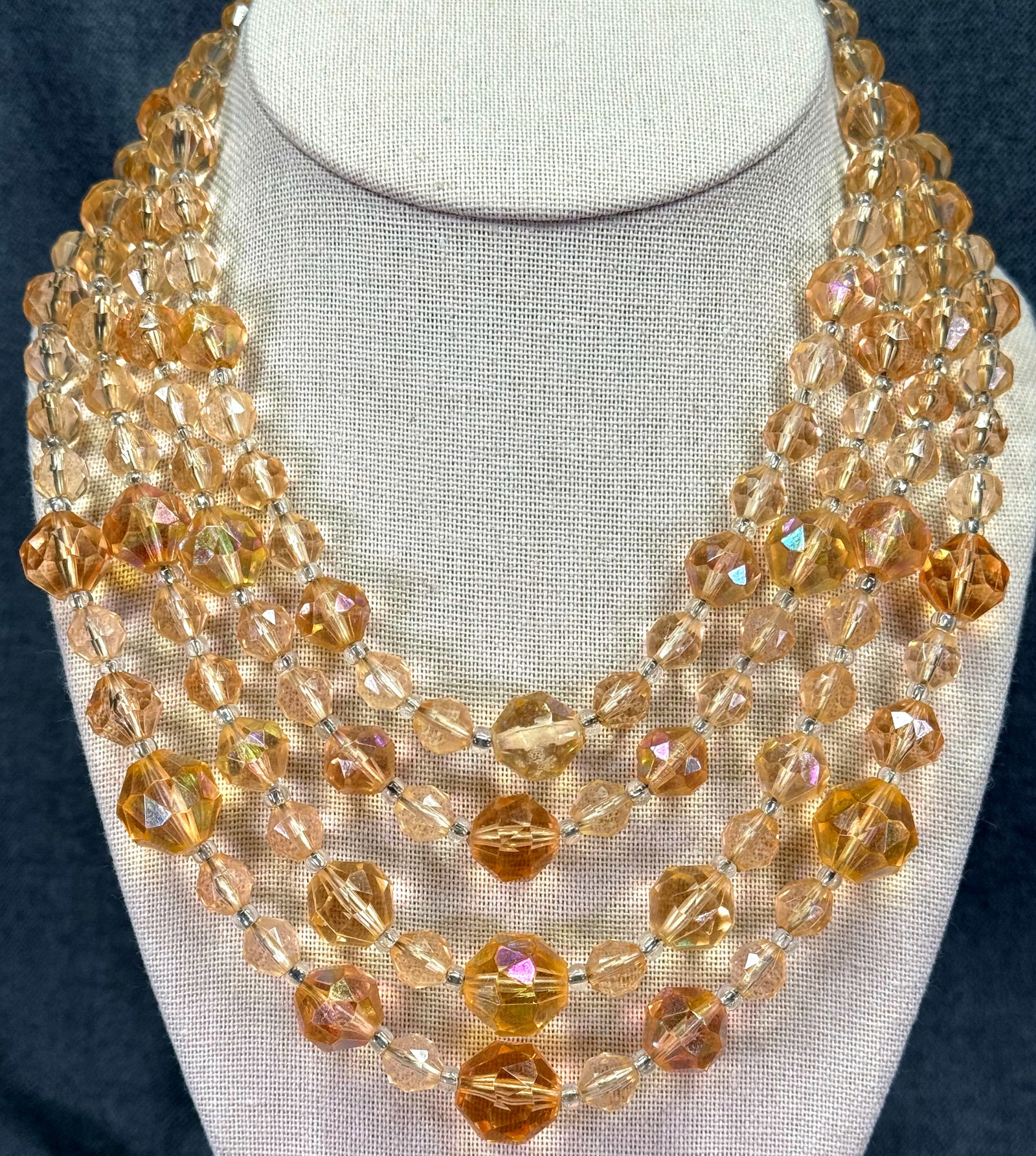 Vintage Japan iridescent peach plastic beads 4 strands collar bib necklace.: Vintage Japan iridescent peach plastic beads 4 strands collar bib necklace.. Marked. For measures please refer to the pictures taken with a measuring tape. Weight: 70 Grams. IN HOUSE FLAT SHIPPING & H
