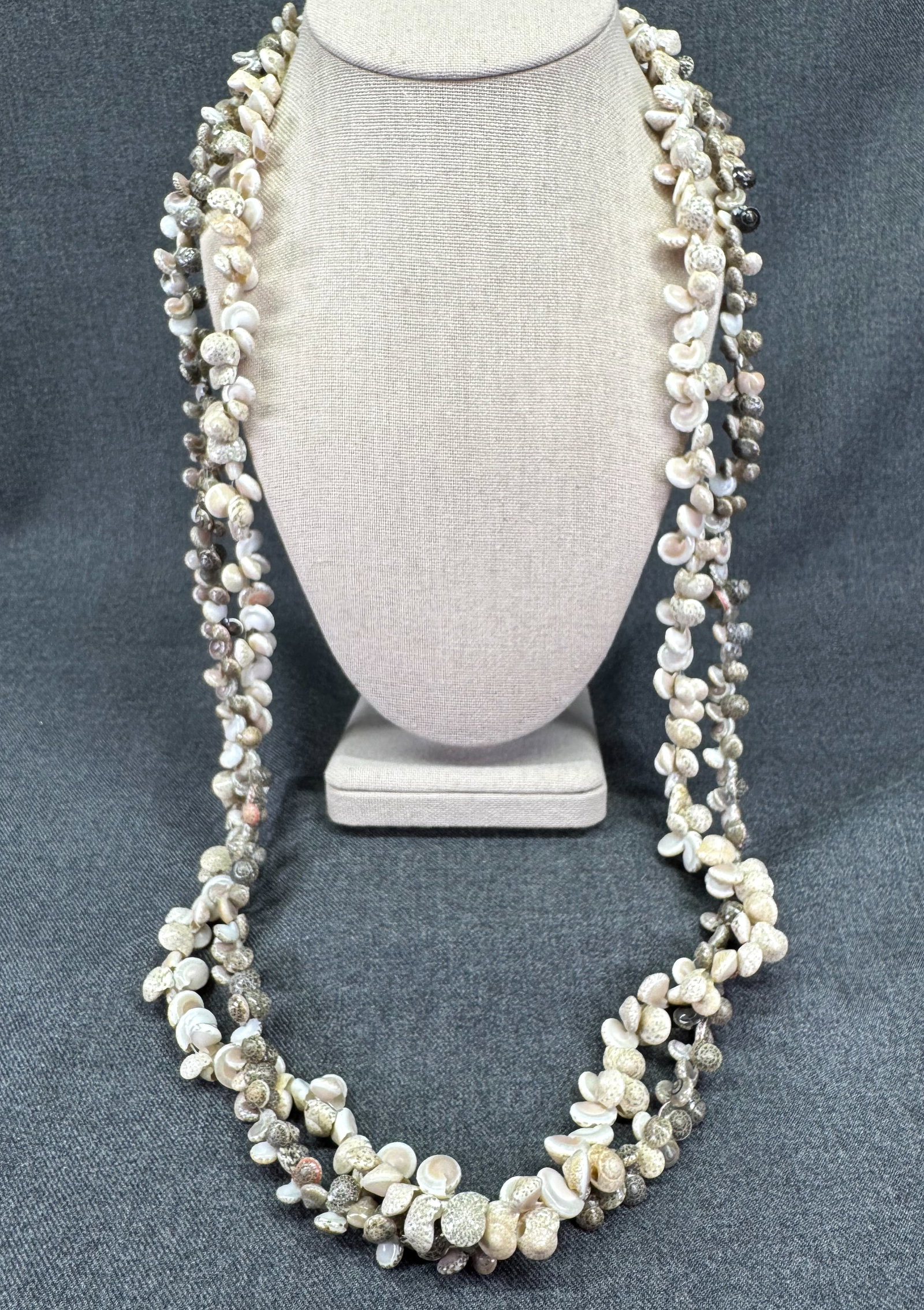 Vintage Hawaiian shell necklace Lei. Lot of 2. *L: Vintage Hawaiian shell necklace Lei. Lot of 2. Unmarked. For measures please refer to the pictures taken with a measuring tape. Weight: 98 Grams. IN HOUSE FLAT SHIPPING & HANDLING COST WITHIN ALL THE 