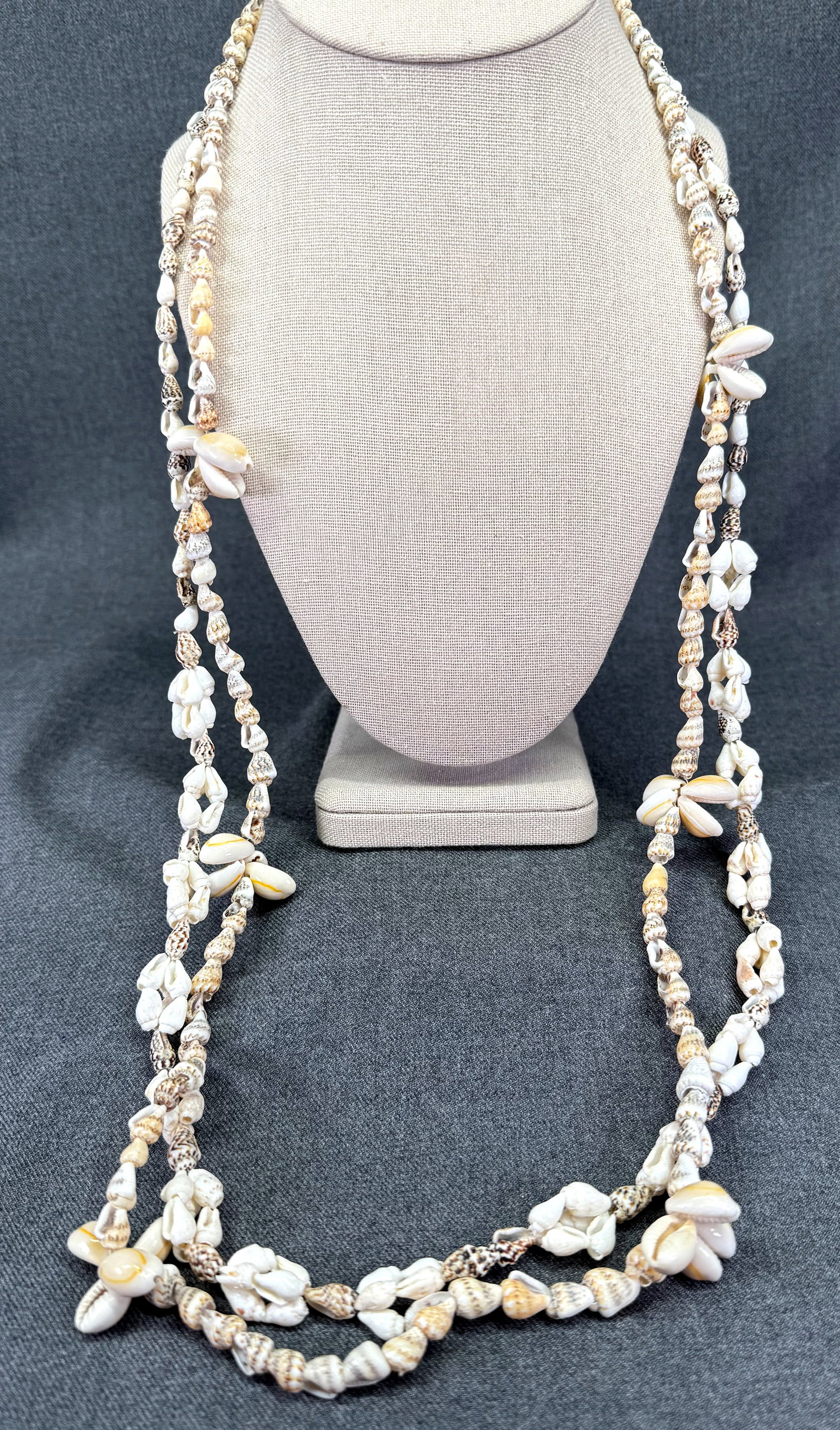 Vintage Hawaiian shell necklace Lei. Lot of 2. *L: Vintage Hawaiian shell necklace Lei. Lot of 2. Unmarked. For measures please refer to the pictures taken with a measuring tape. Weight: 42 Grams. IN HOUSE FLAT SHIPPING & HANDLING COST WITHIN ALL THE 