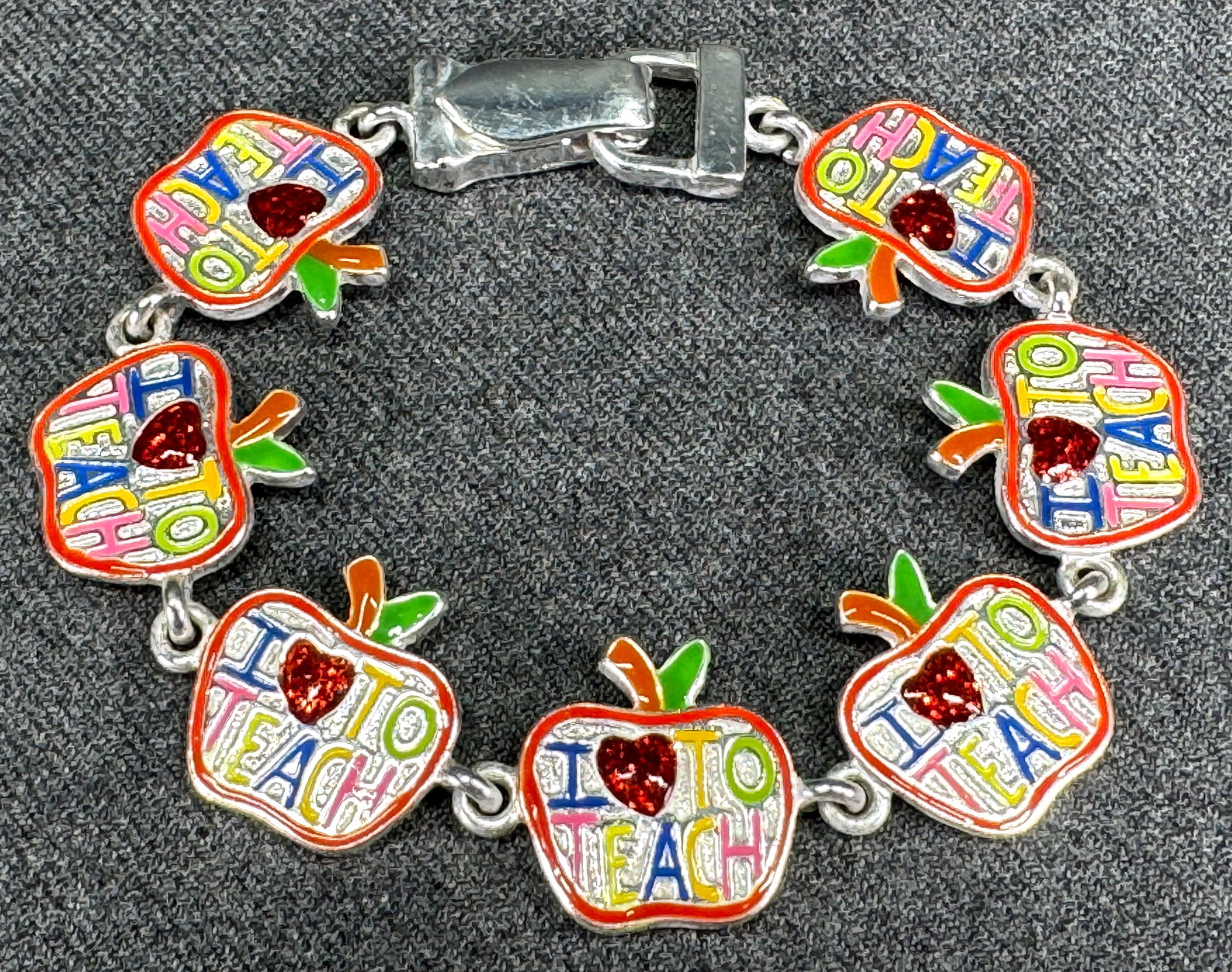 I Love to teach enamel silvertone metal bracelet.: IN HOUSE FLAT SHIPPING & HANDLING COST WITHIN ALL THE U.S. : 7 To bypass LiveShipping, and use our In-House shipping service for 7 or shipping combined for multiple lots, please select “Arrange 