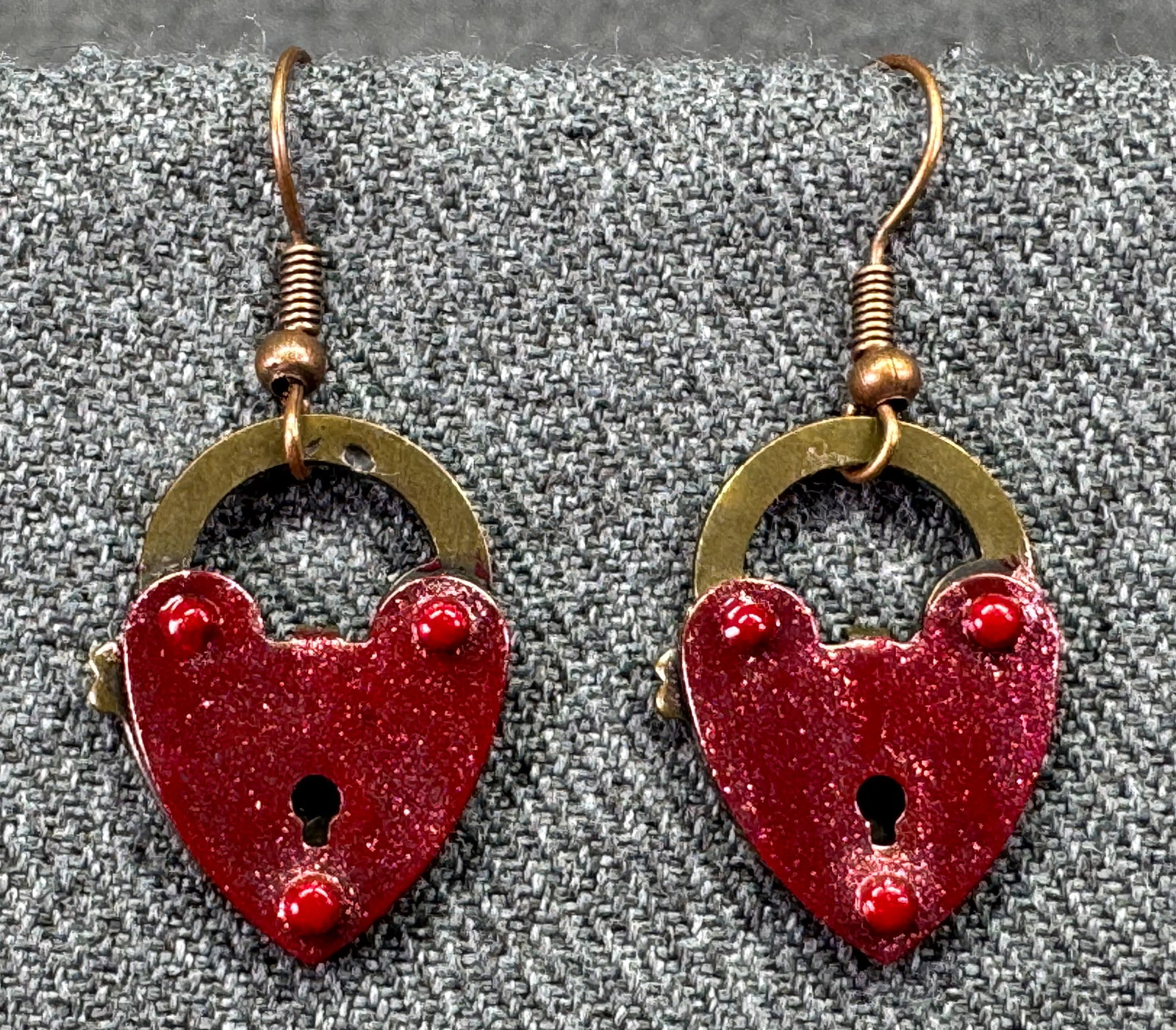 Vintage sweetheart glitter enamel brass padlock hook earrings. #B: Vintage sweetheart glitter enamel brass padlock hook earrings. Unmarked. For measures please refer to the pictures taken with a measuring tape. Weight: 5 Grams. IN HOUSE FLAT SHIPPING & HANDLING COST 