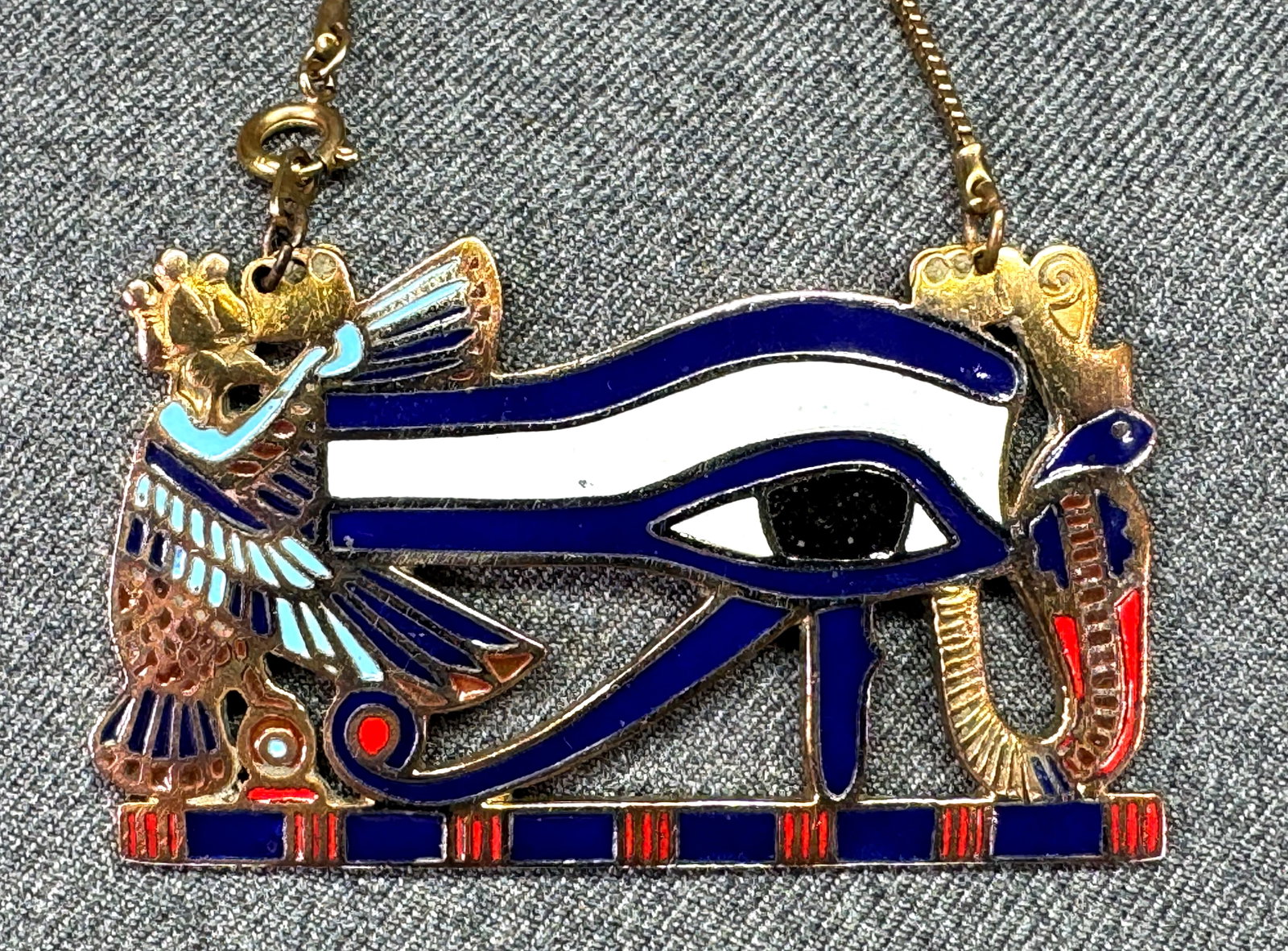 Vintage 1970s Egyptian Revival Enamel Eye of Horus Udjat Eye Pendant Necklace. *n: Vintage 1970s Egyptian Revival Enamel Eye of Horus Udjat Eye Pendant Necklace. Unmarked. For measures please refer to the pictures taken with a measuring tape. Weight: 4.18 Grams. IN HOUSE FLAT SHIPPI