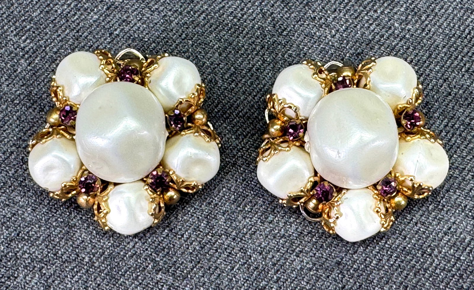 1950s DeMario Style Pearl Crystal Earrings. *n: Vintage Mid Century DeMario Style Faux Baroque Pearl & Amethyst Color Crystals Filigree Clip Earrings. Gold tone. Unmarked. For measures please refer to the pictures taken with a measuring tape. Weigh
