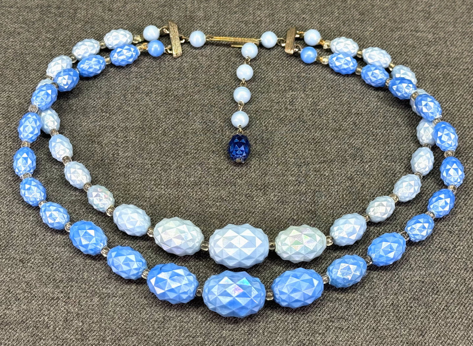 1950s W Germany Lucite Choker Necklace. *n: Vintage W Germany 2 Strand Aurora Borealis Pastel Blue Faceted lucite Choker Necklace. Marked. For measures please refer to the pictures taken with a measuring tape. Weight: 37 Grams. IN HOUSE FLAT SH