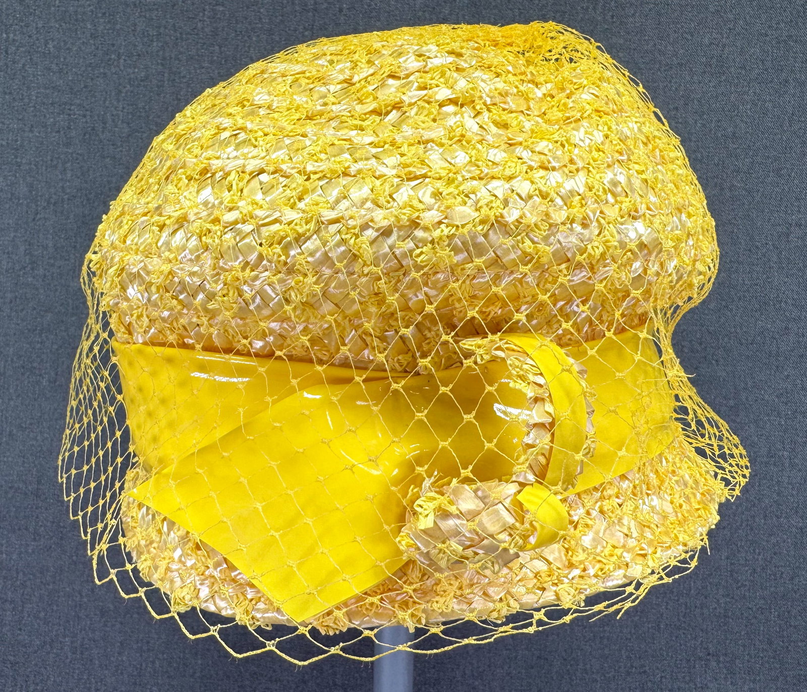 Vintage 1960s Yellow Cello Straw, Vinyl Hat. Birdcage Veil. *i: Vintage 1960s Yellow Cello Straw, Vinyl Hat. Birdcage Veil. Unmarked. Interior circumference measures around 21 inches. IN HOUSE FLAT SHIPPING & HANDLING COST WITHIN ALL THE U.S. : $10 To bypass LiveS