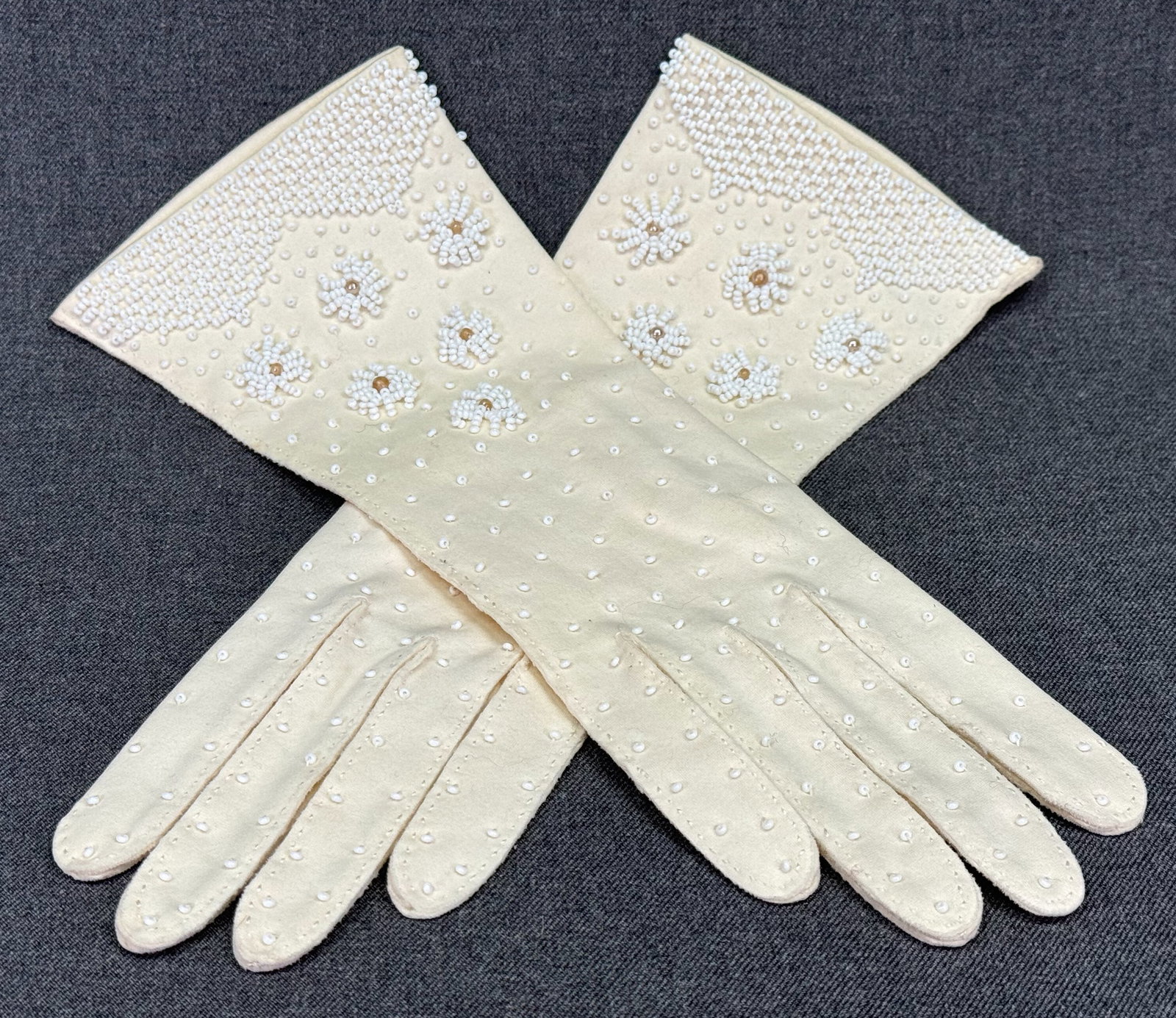 Vintage hand embroidery glass beads flowers double cotton gloves. Size 7 *a: Vintage hand embroidery glass beads flowers double cotton creamy white gloves. Size 7. Made in Hong Kong. For measures please refer to the pictures taken with a measuring tape. Weight: 57 Grams. IN HO