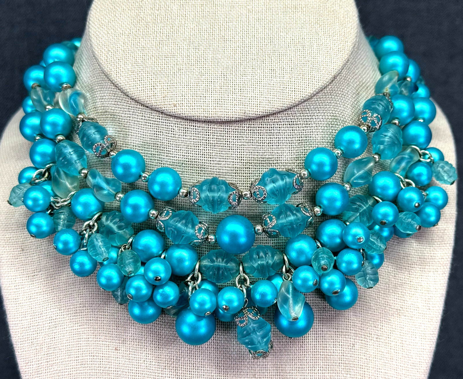1960s Bib Cluster Dangles Choker. *o: Vintage Mid Century Triple Strand Beaded Bib Choker Necklace Cluster Dangles . Aqua Blue Faux Pearl Resins beads, silver-tone. Unmarked. For measures please refer to the pictures taken with a measurin