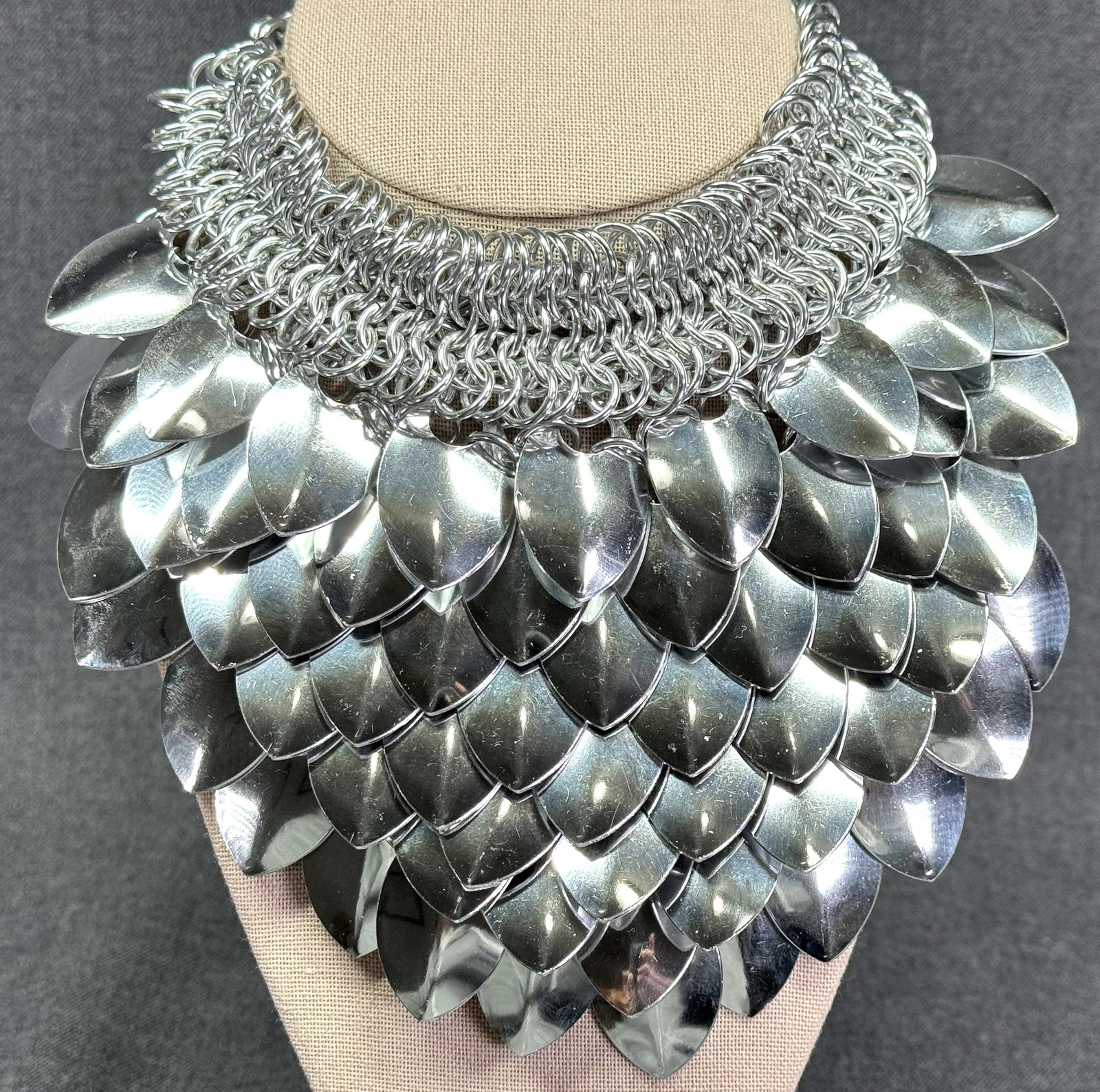 Anodized Aluminum Scalemail Bib Necklace. *o: Fantasy Armor Hand-Woven Silver Anodized Aluminum Scalemail Bib Necklace with Chainmaille Collar. Unmarked. For measures please refer to the pictures taken with a measuring tape. Weight: 125 Grams. IN