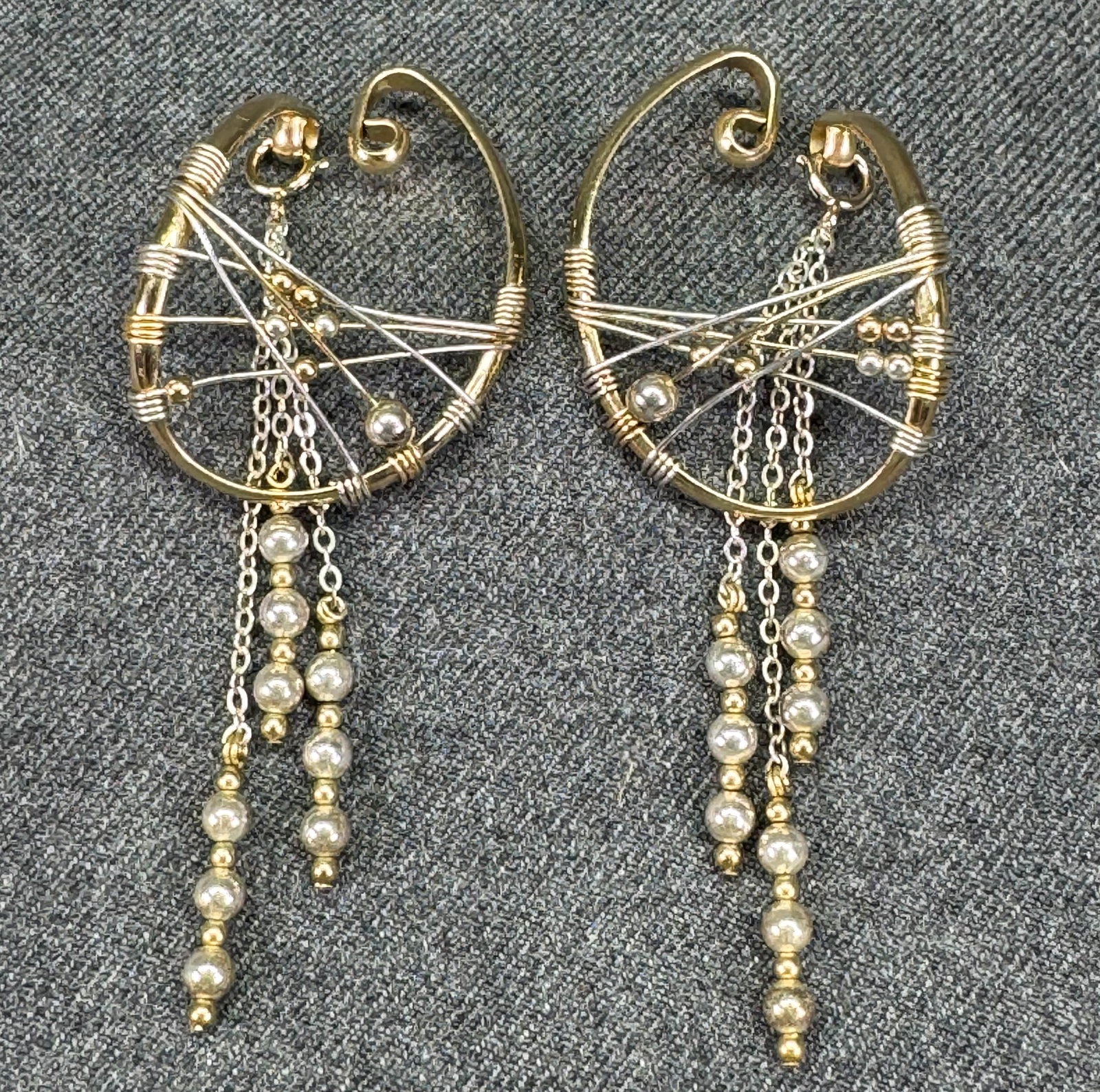 Barbara Barnett Vintage Gold Filled Sterling HOOKer Earrings. *o: Vintage 1980s Barbara Barnett "HOOKer" non-pierced ear wraps features a convertible, mixed-metal design handcrafted from gold-filled and sterling silver wire. The matching metallic bead chains attach 