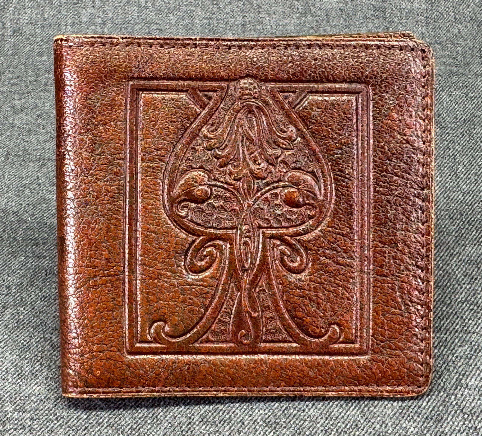Antique Art Nouveau Liberty Style Embossed Leather Bifold Wallet. #o: Antique Art Nouveau Liberty Style Embossed Leather Bifold Wallet. Unmarked. For measures please refer to the pictures taken with a measuring tape. Weight: Grams. IN HOUSE FLAT SHIPPING & HANDLING COST