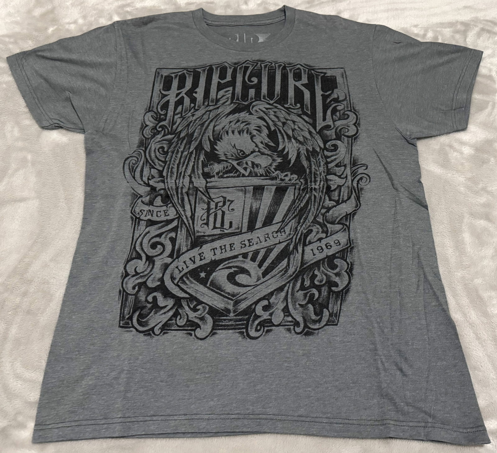 NOS 90s Vintage Rip Curl Grey Eagle Shield Live The Search Tee: Unused Intricate large center chest screenprint featuring an aggressive American bald eagle atop a heritage shield. Features gothic style "RIP CURL" font accents along with ribbon text scrolls reading