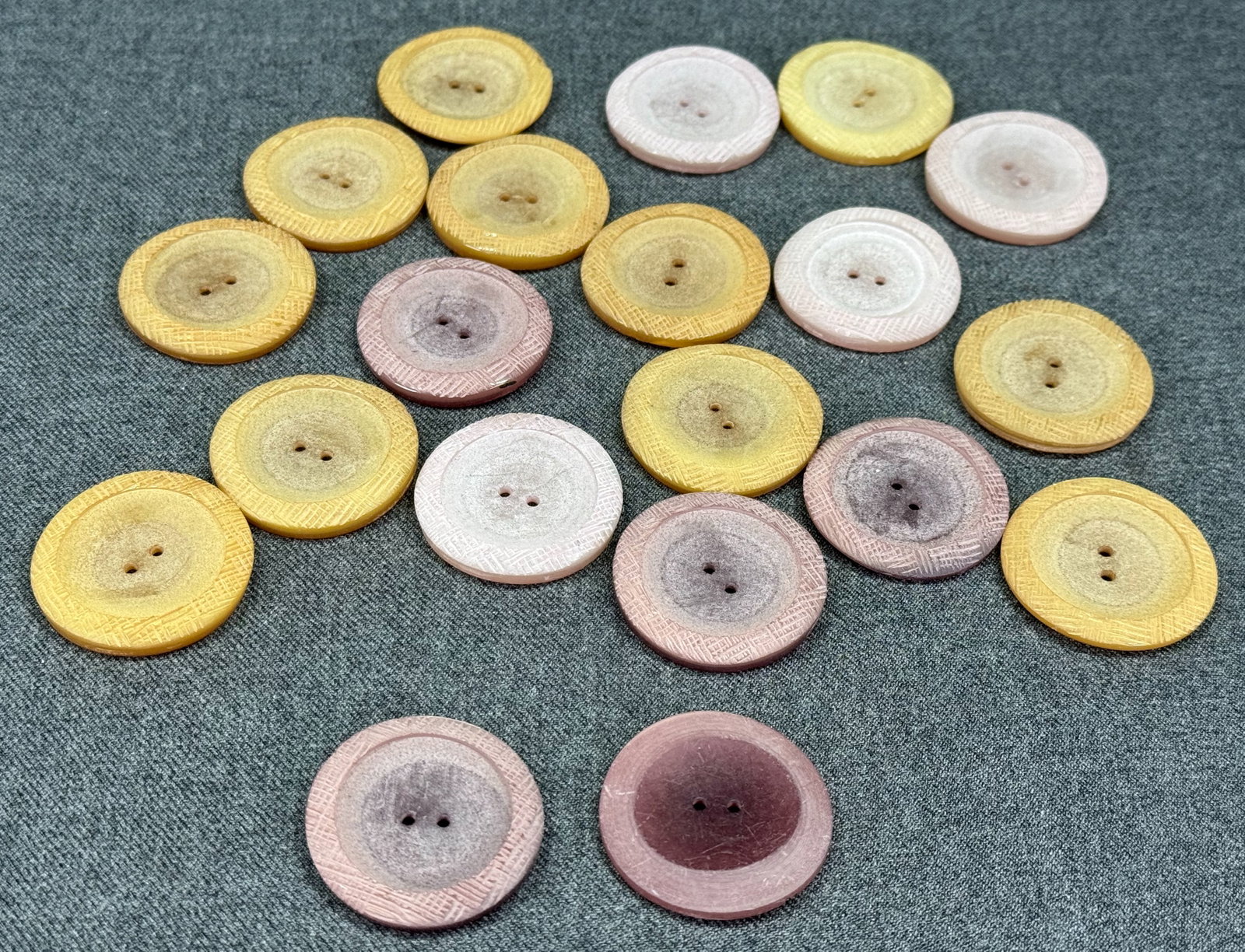 1960s Artisan crafted Plastic buttons. Lot of 20: Vintage artisan crafted honey color, purple & lilac plastic buttons. Lot of 20. Unused. For measures please refer to the pictures taken with a measuring tape. Weight: 60 Grams. IN HOUSE FLAT SHIPPING 