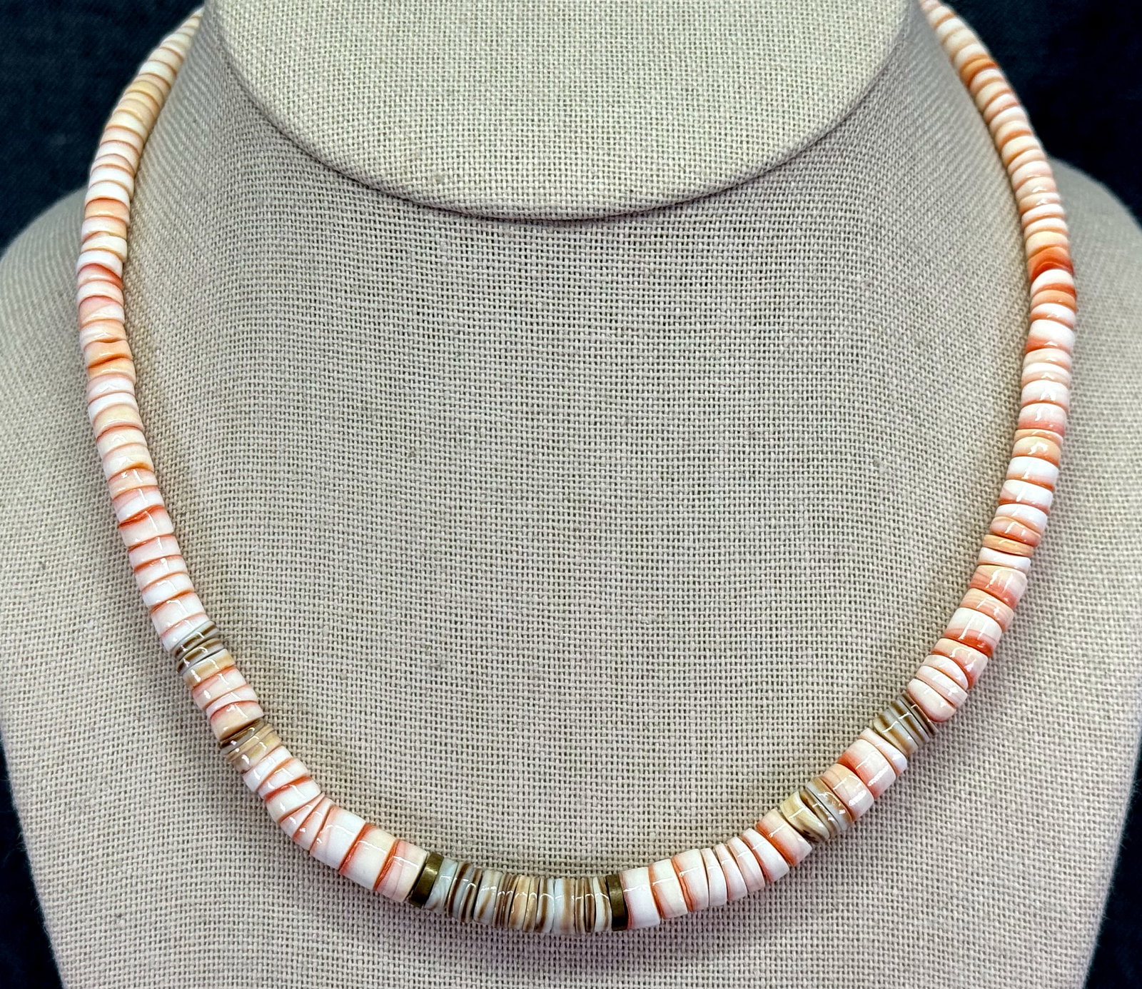 Hawaiian Vintage 1970s Oyster Shell Heishi Bead Surfer Necklace. #p: Hawaiian Vintage 1970s Oyster & Conus Shell Heishi, Bronze Bead Surfer Necklace. Unmarked. For measures please refer to the pictures taken with a measuring tape. Weight: Grams. IN HOUSE FLAT SHIPPING 