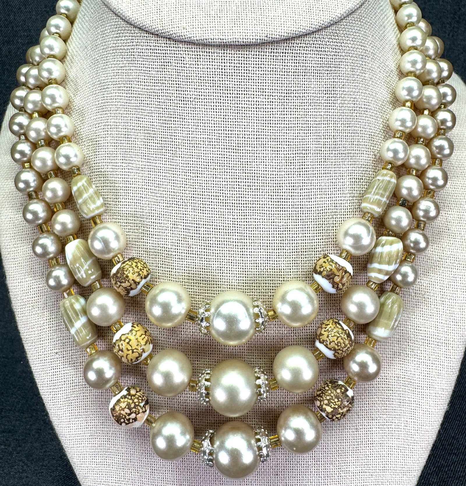 Japan 1960s Faux Pearl Glass Sugar Bead 3-Strand Necklace. #p: Japan 1960s Faux Pearl Glass Sugar Bead 3-Strand Necklace. Gold-tone. Marked. For measures please refer to the pictures taken with a measuring tape. Weight: 62 Grams. IN HOUSE FLAT SHIPPING & HANDLING