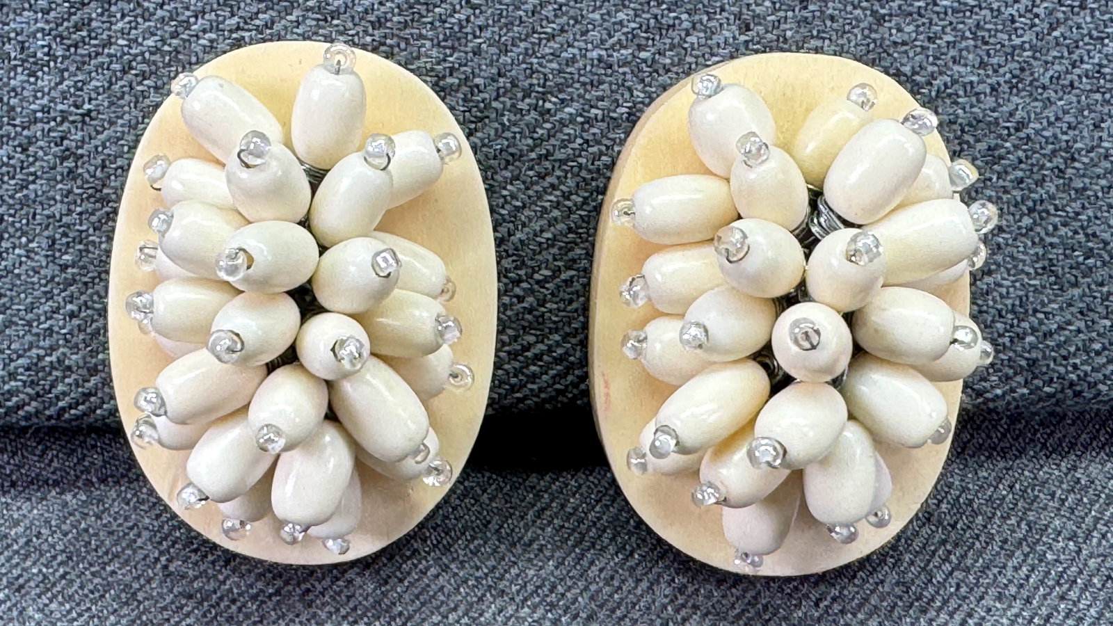 Vintage Italian Mid-Century Bone & Glass Cluster Clip Earrings. #p: Vintage Italian Mid-Century Bone & Glass Cluster Clip Earrings. Unmarked. For measures please refer to the pictures taken with a measuring tape. Weight: 35 Grams. IN HOUSE FLAT SHIPPING & HANDLING COS