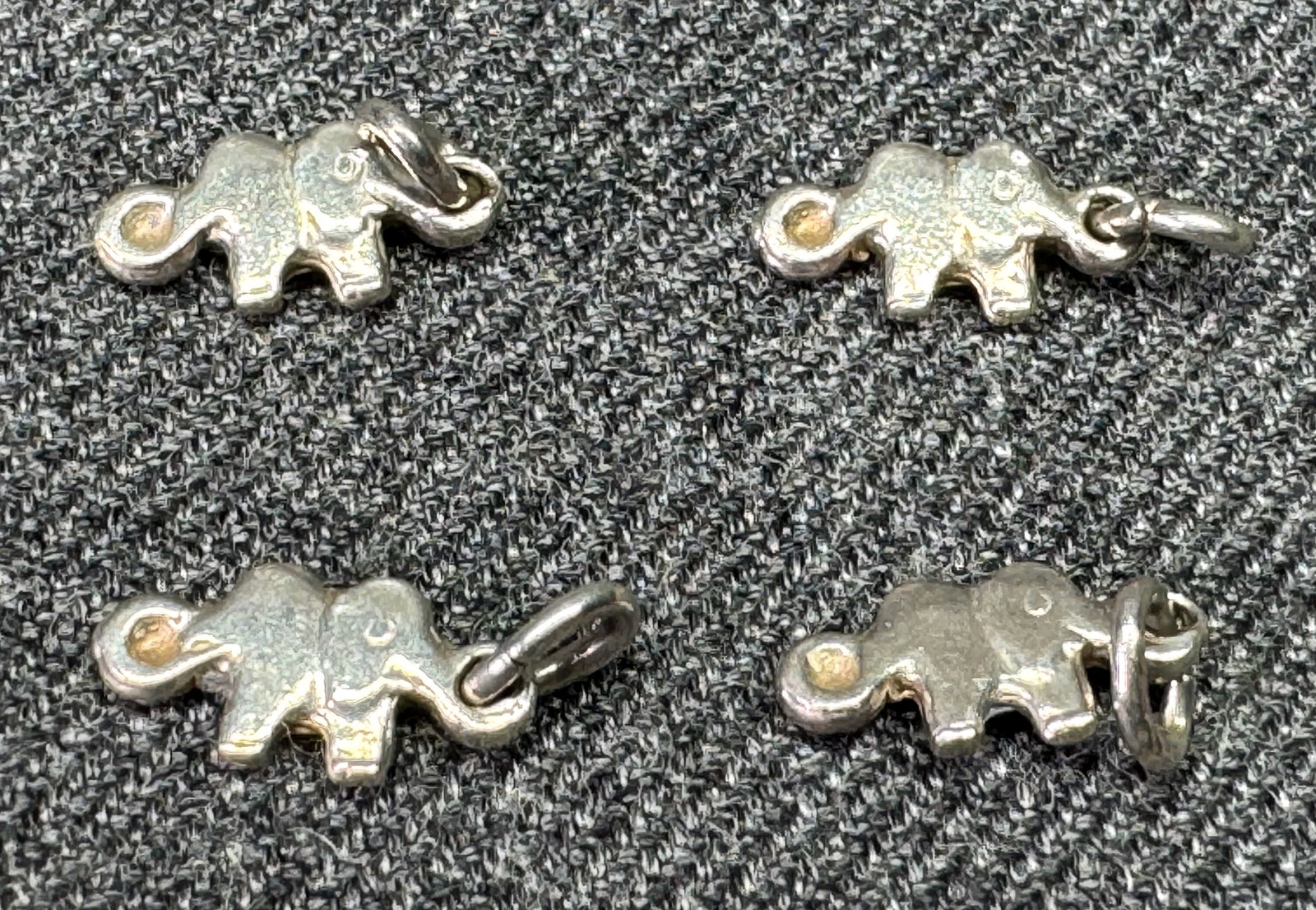 Vintage Sterling Silver Elephant Charm. Lot of 4. #p: Vintage Sterling Silver Elephant Charm. Lot of 4. Unmarked. For measures please refer to the pictures taken with a measuring tape. Weight: 1.42 Grams. IN HOUSE FLAT SHIPPING & HANDLING COST WITHIN ALL