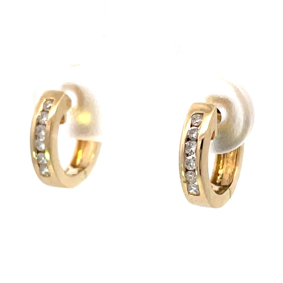YELLOW GOLD DIAMOND HOOPS: 14KT YELLOW GOLD CHANNEL SET SMALL HUGGIE HOOP EARRINGS SET WITH 12=0.15CTW ROUND CUT DIAMONDS OF H COLOR AND SI2 CLARITY. WEIGHING 2.19 GRAMS, HOOPS MESURE AT 11MM