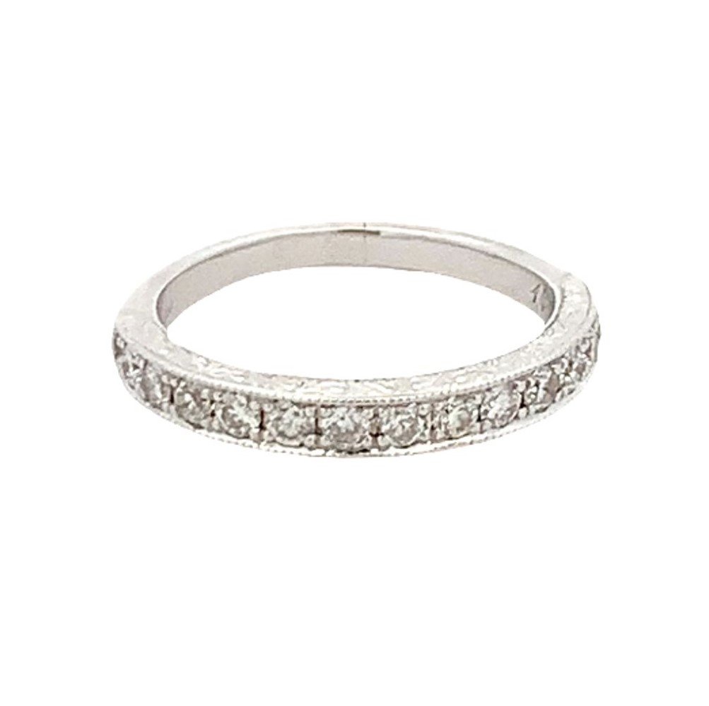 14KT WHITE GOLD DIAMOND BAND: THIS LOVELY 14KT WHITE GOLD WEDDING BAND FEATURES MILGRAIN EDGES AND ENGRAVED SIDES WHILE SET WITH 15= 0.50CTW ROUND CUT NATURAL DIAMONDS OF G/H COLOR AND SI1 CLARITY WEIGHING 3.06 GRAMS.SIZE 6.25