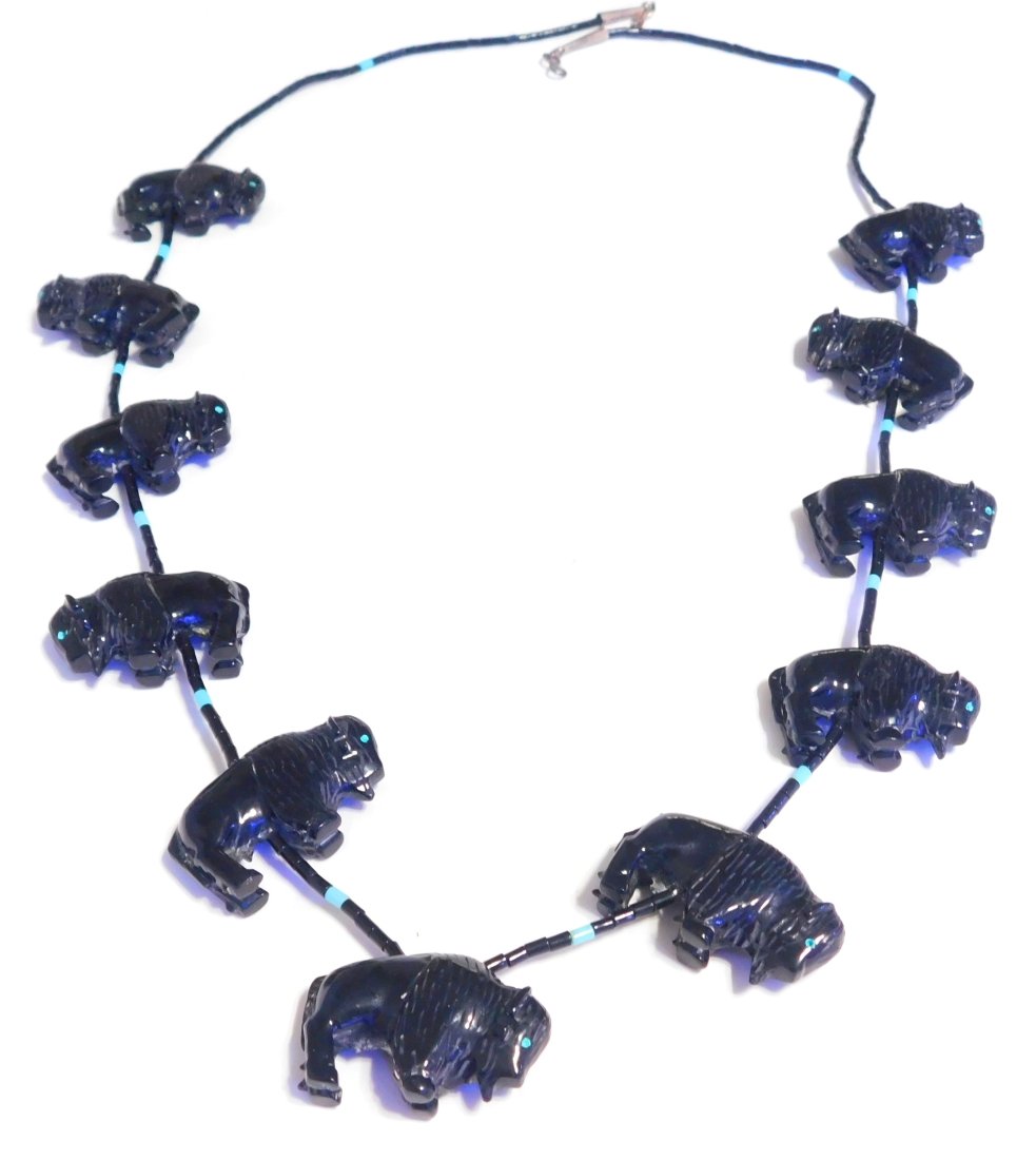 Zuni Native American Carved Jet Buffalo Fetish and Heishi Bead Necklace N236: Thank You for Your Interest...For Sale is a Zuni Native American Carved(Jet) Buffalo Fetish and Heishi Bead Necklace .The Length is 29" and has a Total Weight of 43.5 Grams.