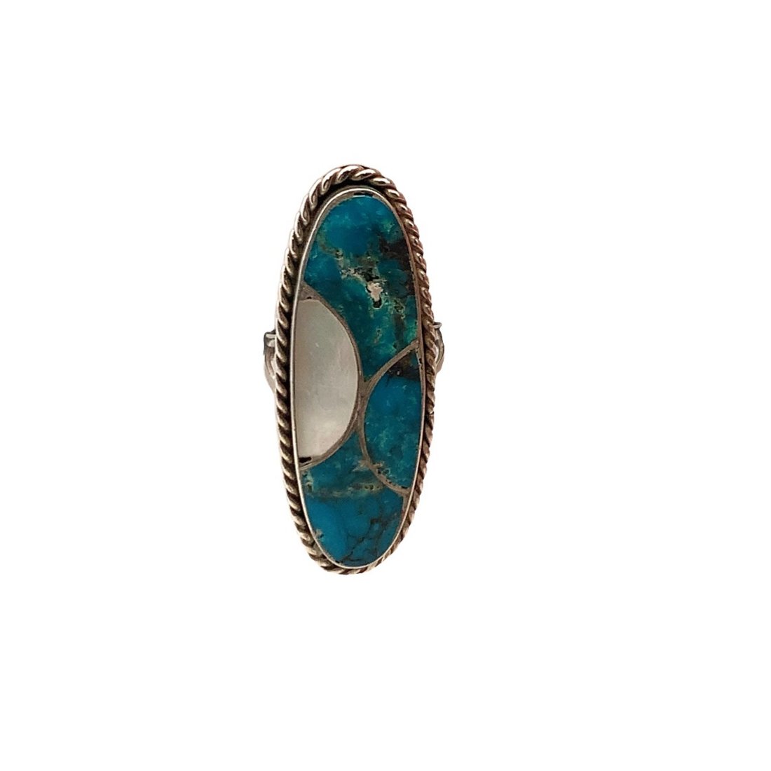 Sterling Silver Native American Turquoise and Mother of Pearl Ring: Elongated sterling silver ring with rope border features inlayed turquoise and single piece of mother of pearl. This ring is signed by Navajo artist "N. Lee" (Norman Lee). The top of the ring measure 