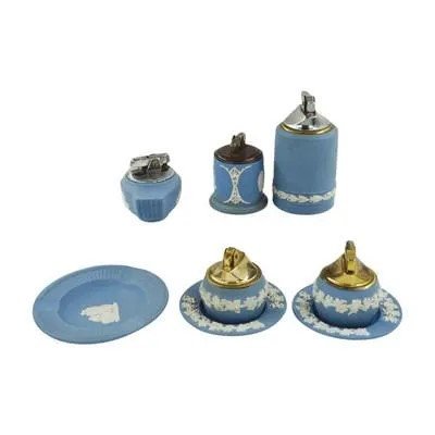 8 WEDGWOOD LIGHTERS & ASHTRAYS: 5 Vintage Wedgwood Table Lighters tallest 4". 3 Vintage Wedgwood Ashtrays largest 4.50". Weight 2 lbs 11 oz. PROVENANCE: A Charleston SC Private Collection.