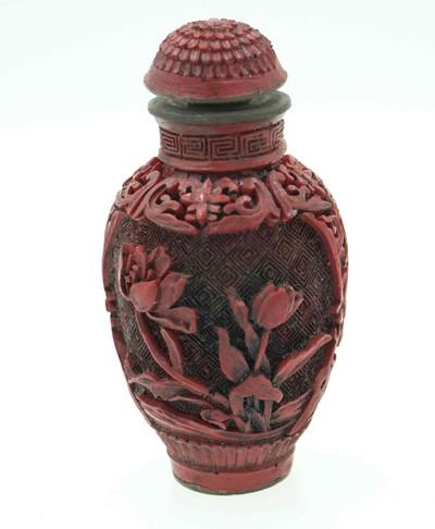 CHINESE CINNABAR CARVED SNUFF: Chinese Cinnabar Carved Snuff Bottle. 2"x2 1/2". Weight 1.2 oz. PROVENANCE: A Charleston SC Private Collection