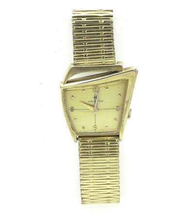 HAMILTON FLIGHT II WRISTWATCH 1960s: Original 1960s futuristic Atomic Age Flight II wrist watch by Hamilton, 10k gold-filled case, manual-wind 22-Jewel movement. Original gilt dial with raised gilt markers. Stretch Band. Runs. The asymme