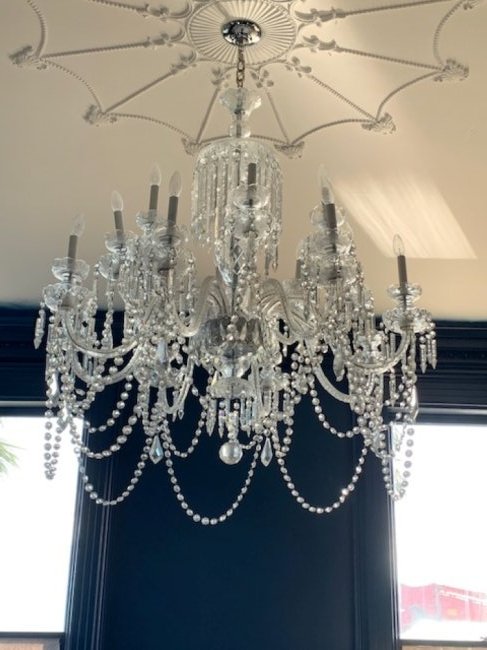 CUT CRYSTAL 16 ARM CHANDELIER CHARLESTON BATTERY: Exceptional Antique Cut Crystal 16 Arm Chandelier. Possibly by Baccarat. From a Historic Charleston Battery Home. 36” H - with crystal and chain hanging 44”X 36” W. In wooden crate.