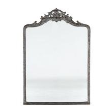 BALLARD DESIGNS BEAUDRY RUBBED BRONZED MIRROR: Ballard Designs Beaudry Mirror Oil Rubbed Bronzed Mirror. In a ornate frame of hand forged Iron with flowing corner scrolls and elegant shell crest. Measures 64"x31.25"x1.50". PROVENANCE: A Charleston