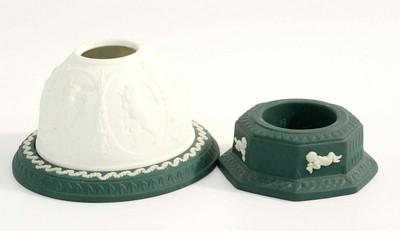 2PC WEDGWOOD SPRUCE GREEN JASPERWARE: 2 pieces vintage Wedgewood in Spruce Green including a votive candle holder and RARE tea light featuring cherubs. Largest piece measures 4.5" inches in width and 3.5 inches in height. Total lot weight