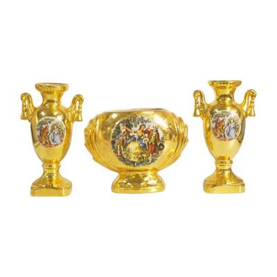 3 PC VINTAGE 22K GOLD PORCELAIN SET: Vintage 3 Piece Warranted 22k Gold, Made in the USA Set of 2 Urns and Center Cache Pot. Urns 8.75". Cache Pot 8"x3.50"x6.25". Weight 3 lbs 11 oz. PROVENANCE: A Charleston SC Private Estate.