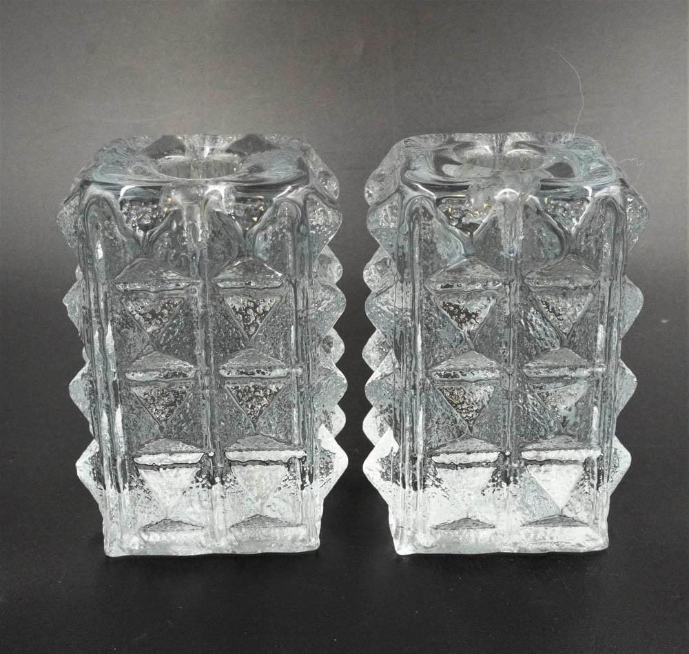 PAIR OF BLENKO DIAMOND PILLAR CANDLESTICKS: Blenko Art Glass Pair Diamond Pillar Candlesticks designed by artist Don Shepherd in 1980. Eames style design. 2.75"x2.75"x4.25". 4 lbs 5 oz. Artist Don Shepherd (1930–2002) studied at the Californi
