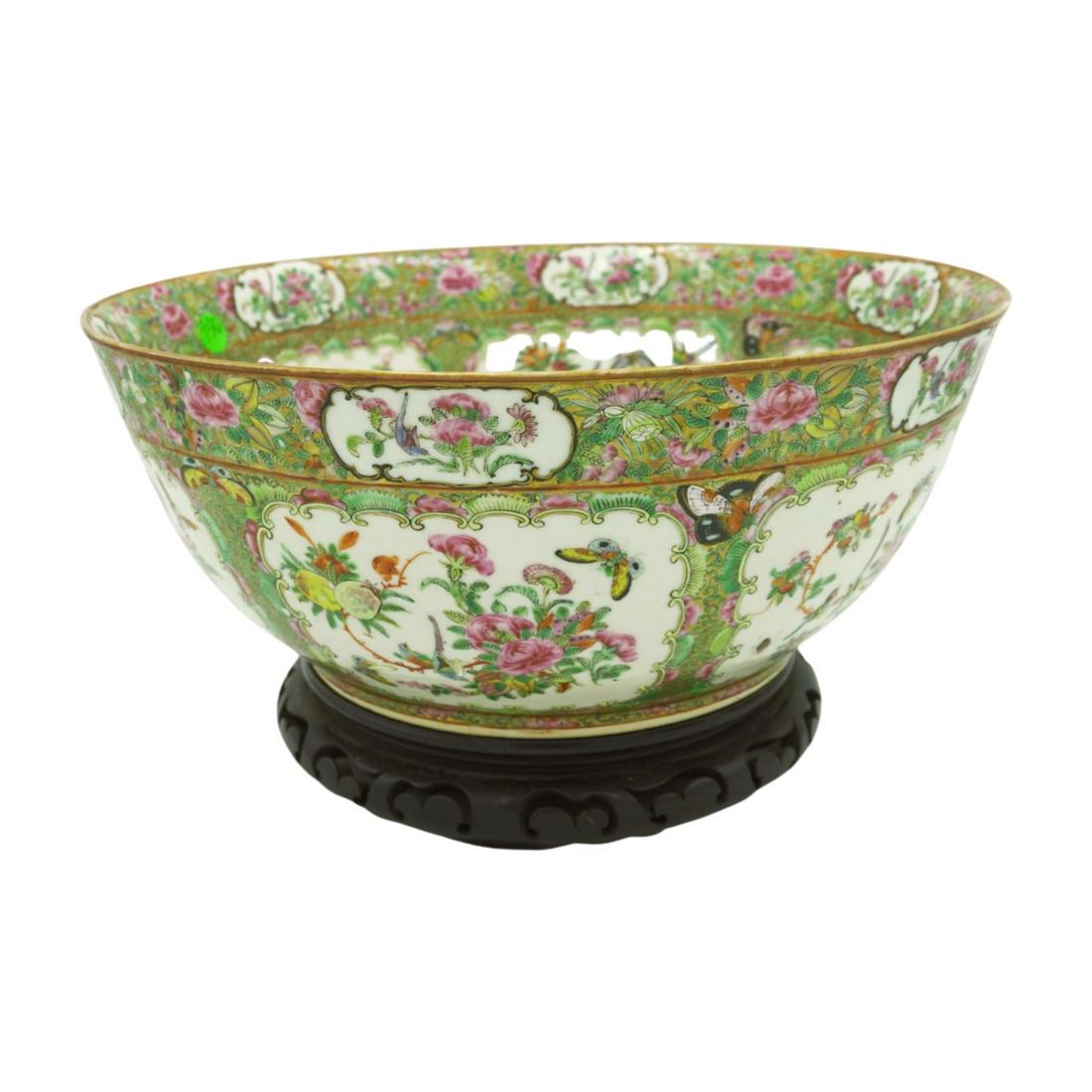 LARGE ANTIQUE ROSE CANTON PUNCH BOWL: Punchbowl, Rose Canton, Chinese 19th century, enameled decoration inside and outside, sections of flowers, birds and butterflies, the vine decorated areas dividing the panels have flying bats, which t