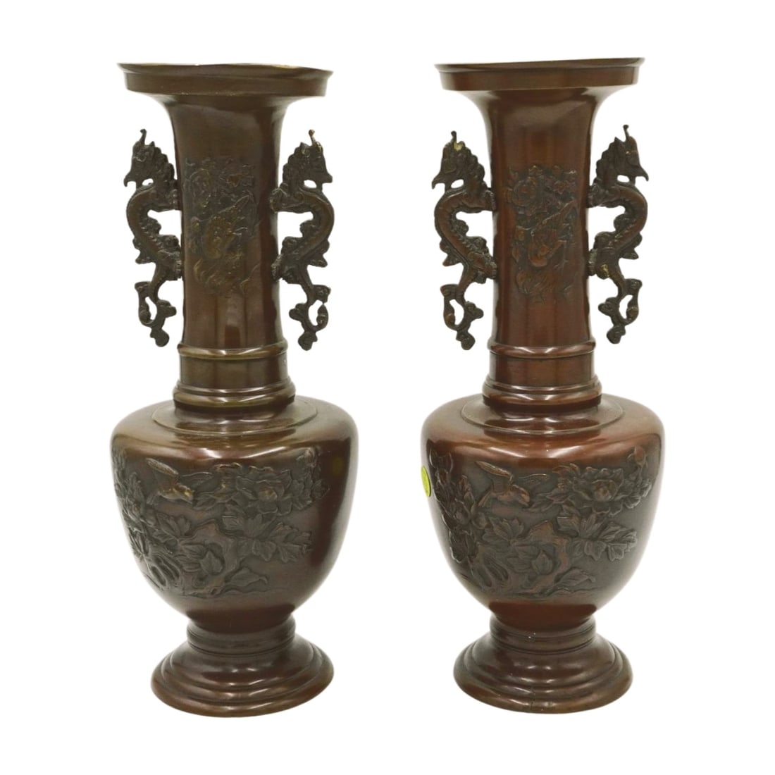 PAIR JAPANESE BRONZE VASES W DRAGONS: Matched Pair of Tall Japanese Bronze Vases with Dragon, Birds and Landscapes. These were at one time mounted as lamps. Each 6"x6"x15". Weight combined 10 lbs 9 oz. PROVENANCE: Gippy Plantation