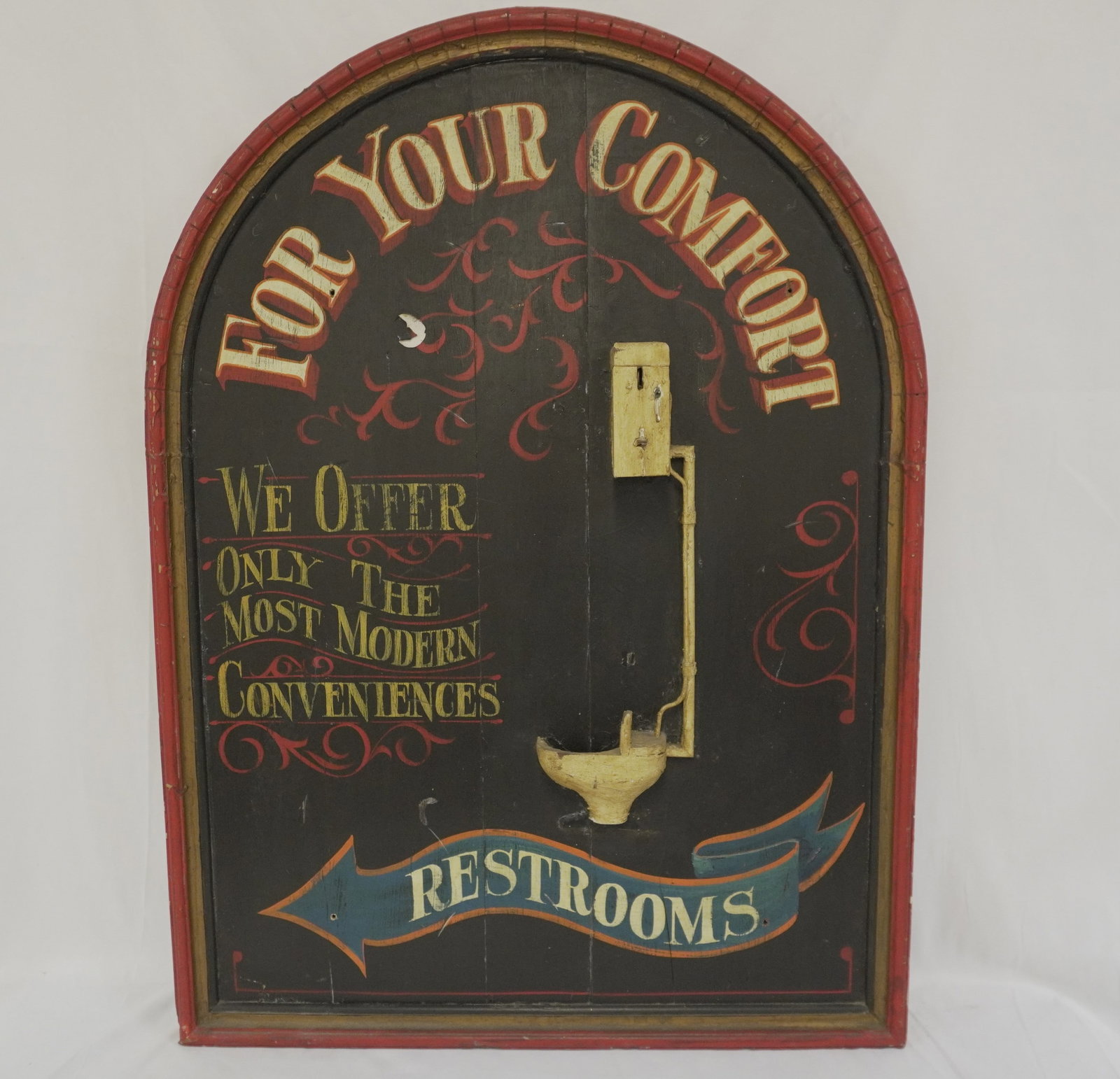 FOR YOUR COMFORT RESTROOMS DIRECTIONAL SIGN: Vintage 1940-50 For Your Comfort Restrooms Directional Sign. Hand Painted on wood. Measures 26"x36"x2.5". Weight 16 lbs. PROVENANCE: The Terri Henning Collection, The Peoples Building Penthouse,18 Bro