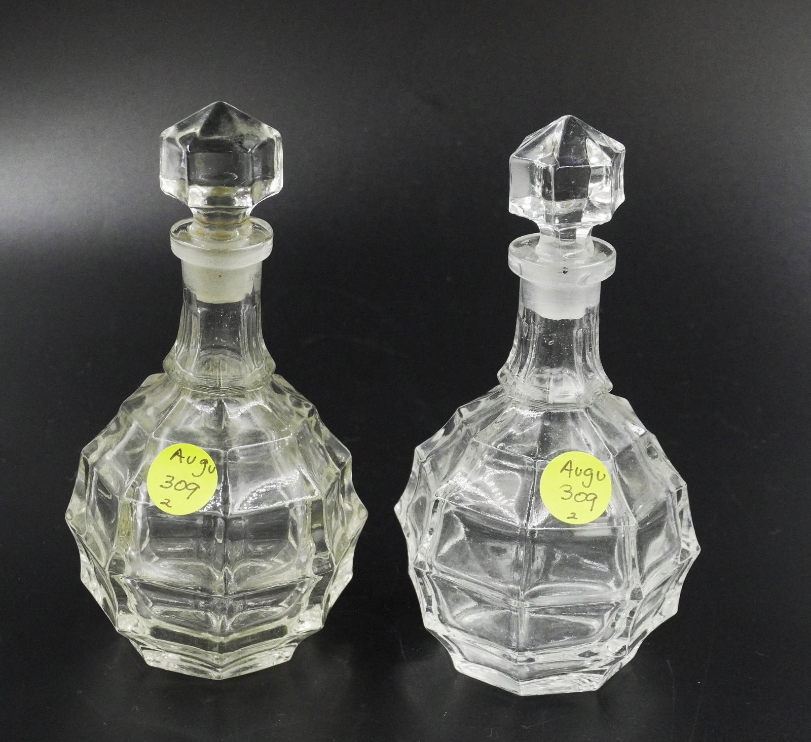 2 MCM GLASS BLOCK PERFUME / DECANTERS: 2 MCM Matching Glass Block Pattern Perfumes / Decanters. 3"x3"x6.25". Weight 1 pd 10 oz.