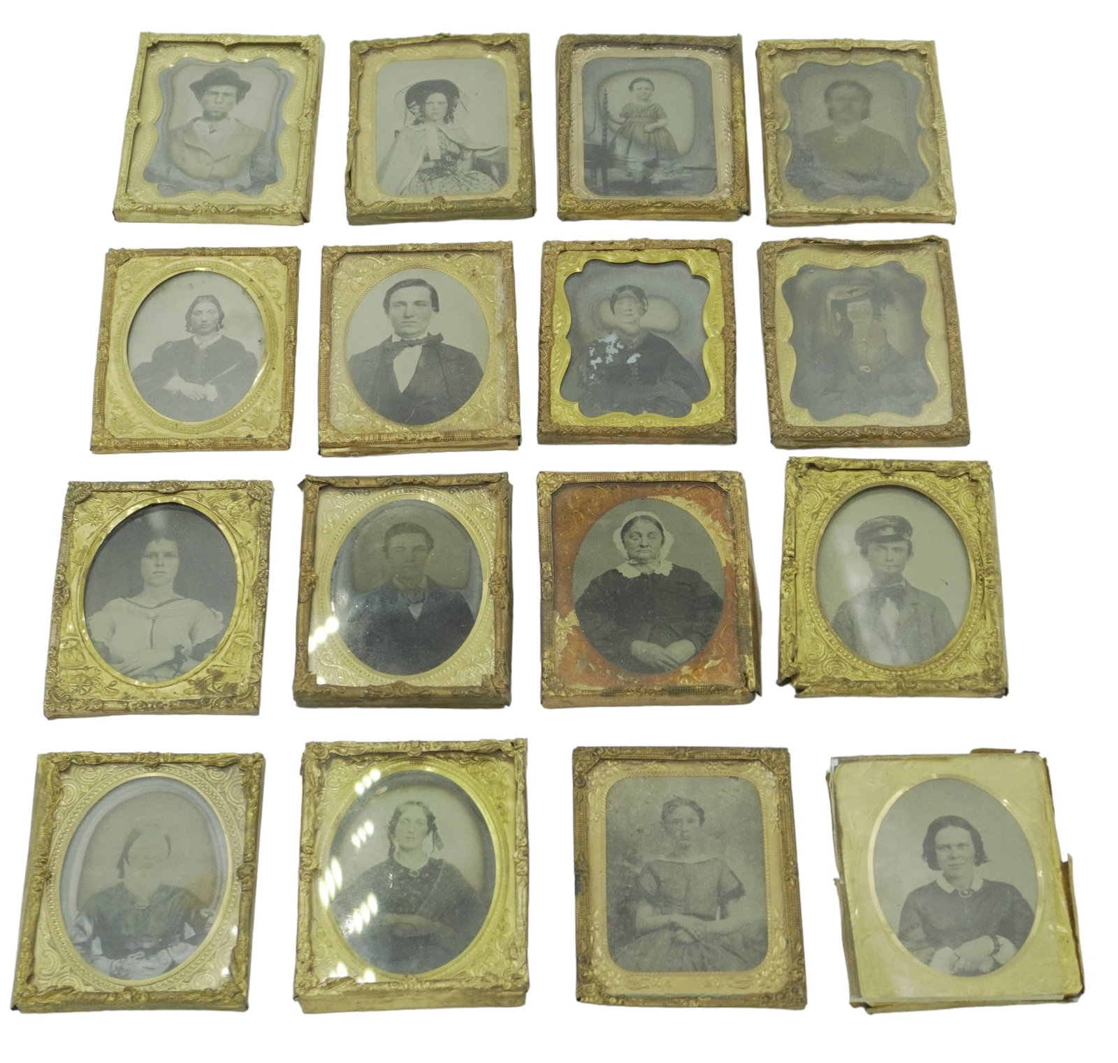 GROUP OF 16 ANTIQUE AMBROTYPES: Grouping of 16 Antique Ambrotypes. All 2"x2.5". Weight 1 lb 3 oz.
