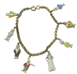 1938 DISNEY ENAMELED SNOW WHITE & 7 DWARFS BRACELET: Original 1938 Disney Snow White & 7 Dwarfs Charm Bracelet hand painted enamel. 7" opened. Weight 0.4 oz.