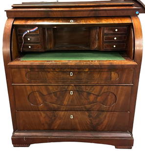 BIEDERMEIER BUREAU A CYLINDRE FLAME MAHOGANY: Biedermeier Mahogany Bureau a Cylindre, mid-19th century, with impressive flame mahogany, the stepped rectangular top above a cylinder roll top opening to a pull-out writing surface and a central