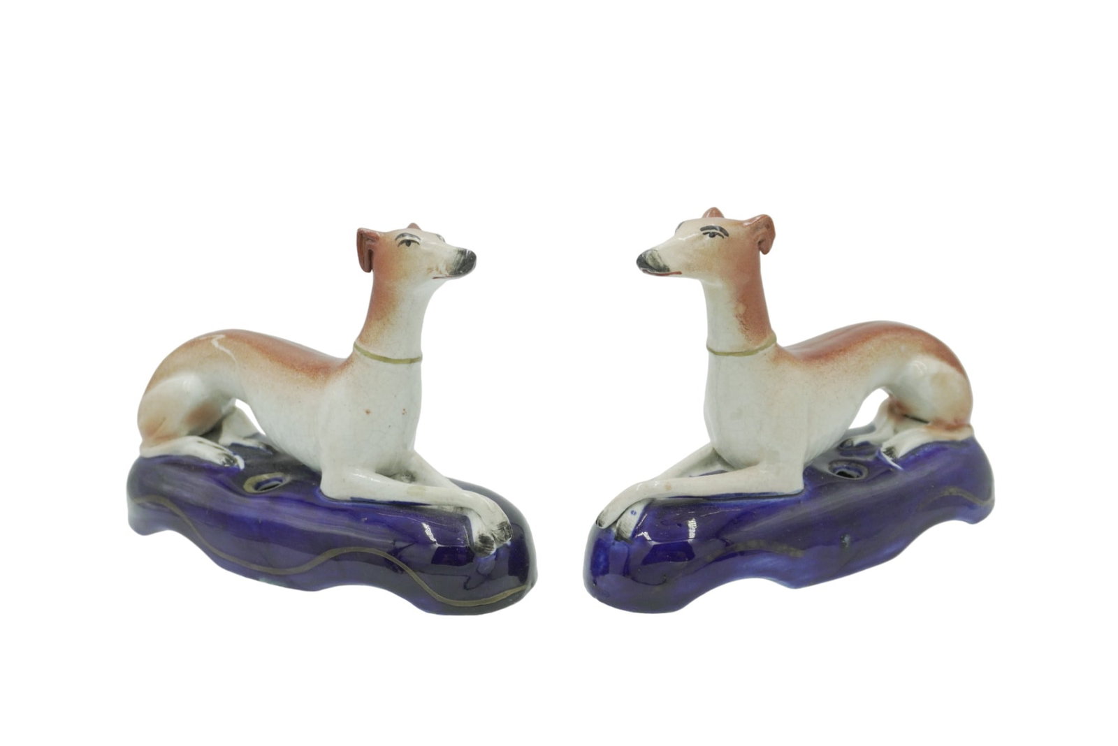 PAIR OF ANTIQUE STAFFORDSHIRE DOGS WHIPPET PEN HOLDERS: Charming set of Staffordshire pottery pen holders in the shape of whippets with gold detailing. Made in the early 19th century most likely between 1815 and 1835. Each one measures about 5" tall and 6.