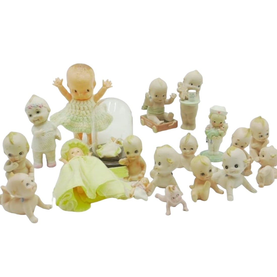 LARGE LOT OF VINTAGE KEWPIES: Group of 19 Vintage Kewpies. Makers include: Lefton, Shakman, Hagen Walker, Rose O'Neil , Jesco and more. Largest measures 6.5" Total weight 3.2lbs.