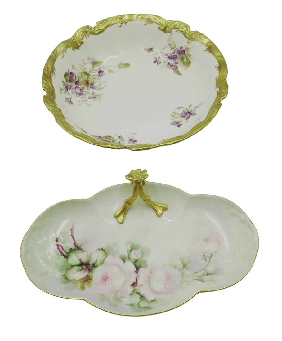 2 LIMOGES HAND PAINTED BOWLS: 2 Antique/Vintage Limoges Hand Painted Bowls. Roses with Gilt Floral Handle 11"x2" by Wm Guerin Co. and Violets with Gilt Rim by Coronet 10.25"x2.5". Weight combined 2 lbs 7 oz.
