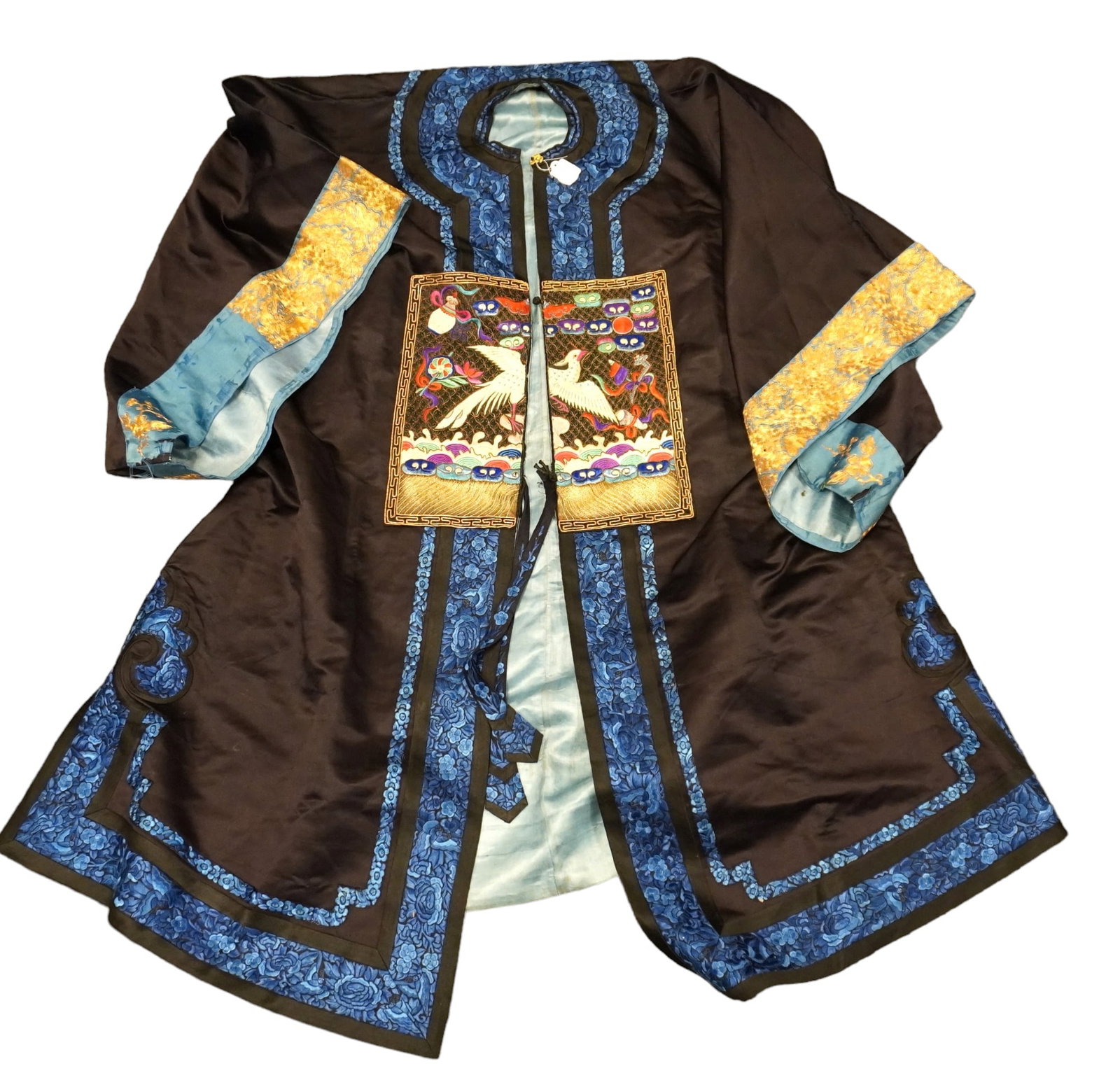 CHINESE SILK CEREMONIAL EMBROIDERED JACKET: Ornate Chinese Ceremonial Embroidered Jachet. Exquisite detail including gold thread. Measures 29" under arm across and 38" long. Weight 2 lbs