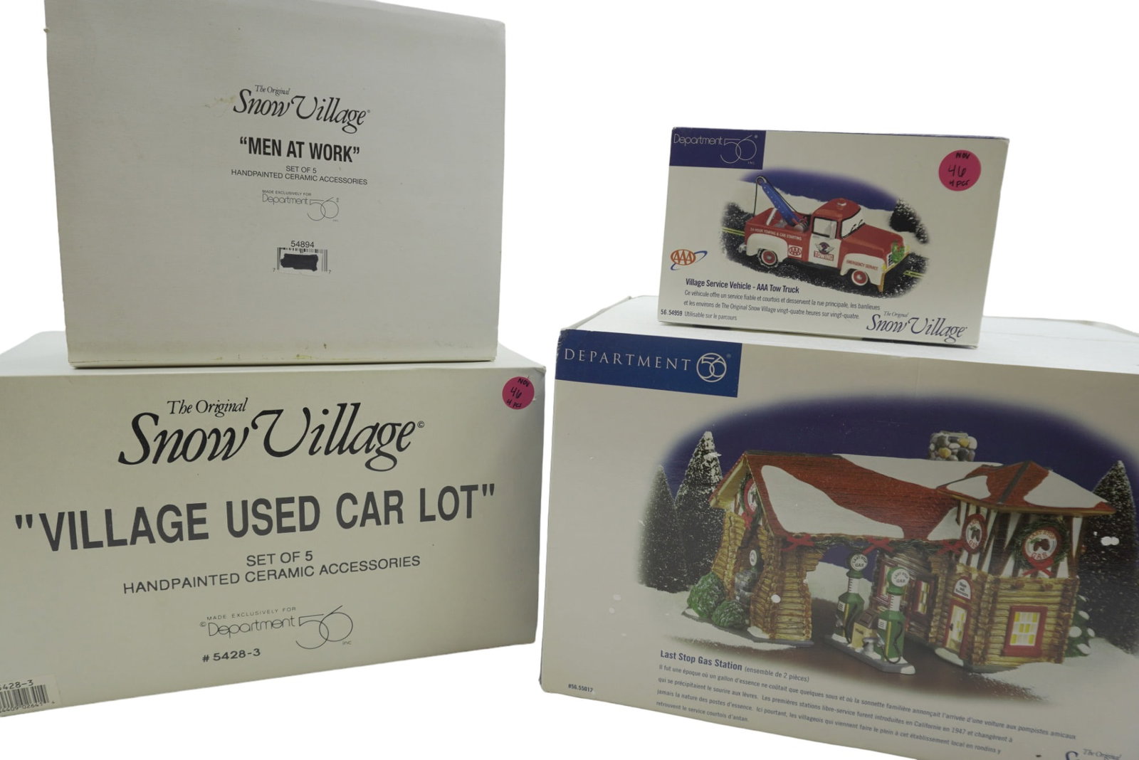 DEPARTMENT 56 SNOW VILLAGE LOT - 4 PIECES: Department 56 "Snow Village" pieces. Total lot weight is 7 lbs. Included in this lot is: Last Stop Gas Station, Village Used Car Lot, Village Service Vehicle - AAA Tow Truck, Men at Work.